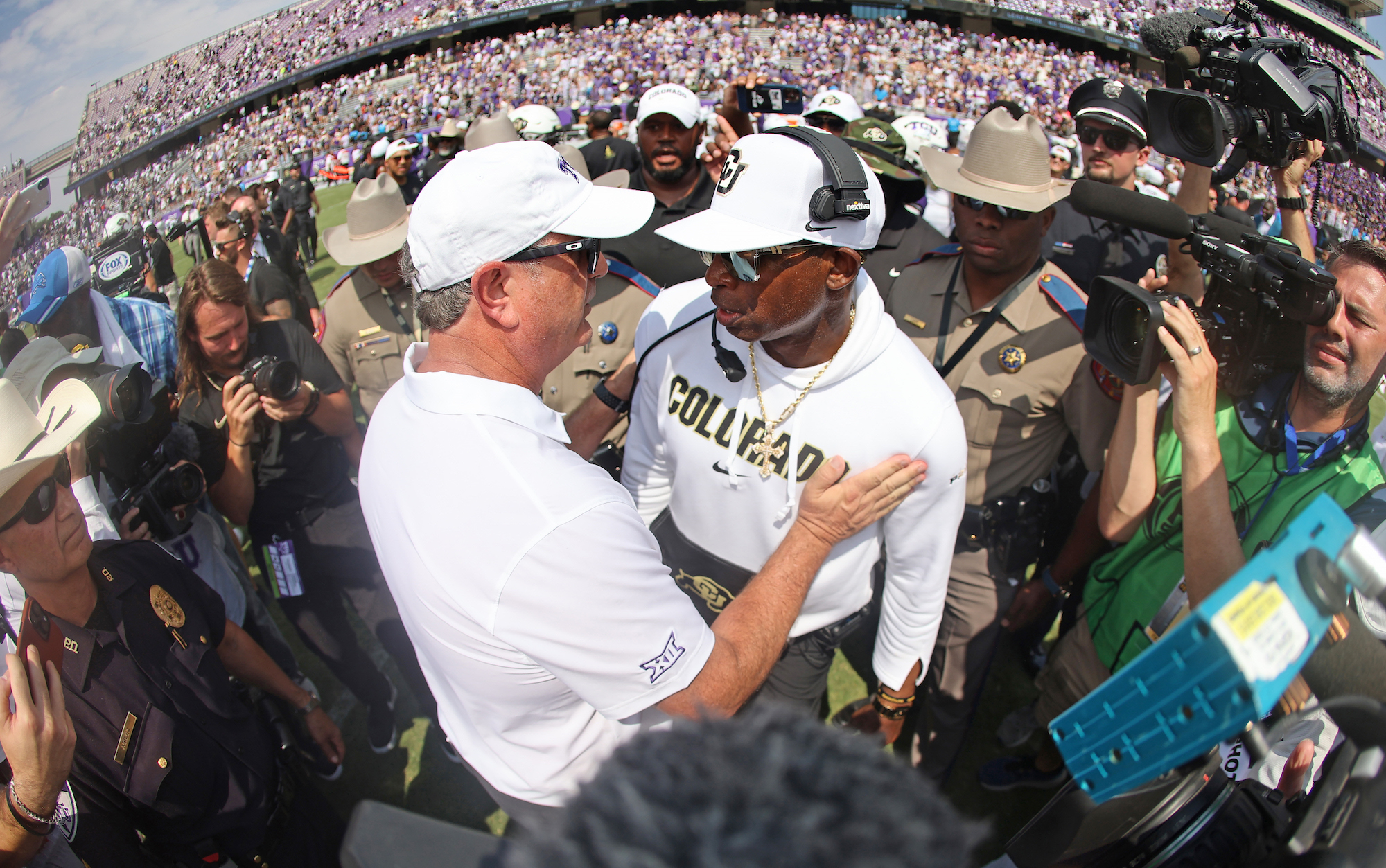Deion Sanders meets with Sonny Dykes after Colorado beats TCU