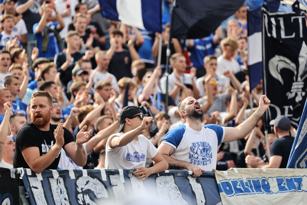 Fans of Darmstadt react during the Bundesliga match between Bayer 04 Leverkusen and SV Darmstadt 98 at BayArena on September 02, 2023 in Leverkusen, Germany.
