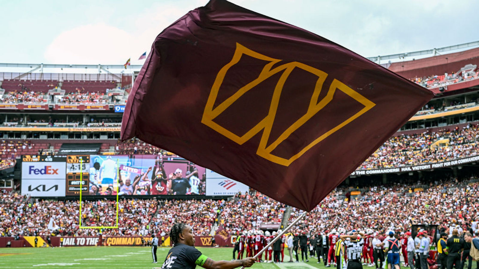 A member of the Washington Commanders cheer squad celebrates a touchdown during the NFL game between the Arizona Cardinals and the Washington Commanders on September 10, 2023 at Fed Ex Field in Landover, MD.