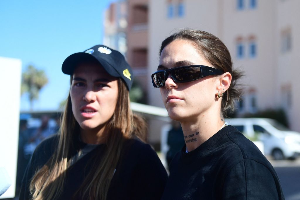 Spain's midfielder Patri Guijarro (L) and Spain's defender Mapi Leon talk to the press after announcing they are leaving the national selection, in front of their hotel in Oliva near Valencia, on September 20, 2023 ahead of the UEFA Nations League football matches against Sweden and Switzerland. New Spain coach Montse Tome named a surprise 23-woman squad for upcoming Nations League qualifiers including 20 players officially on strike. Players demand structural changes in the Spanish football federation (RFEF) after the President forcibly kissed a player on the lips after Spain won the World Cup in Sydney on August 20, provoking worldwide outrage.