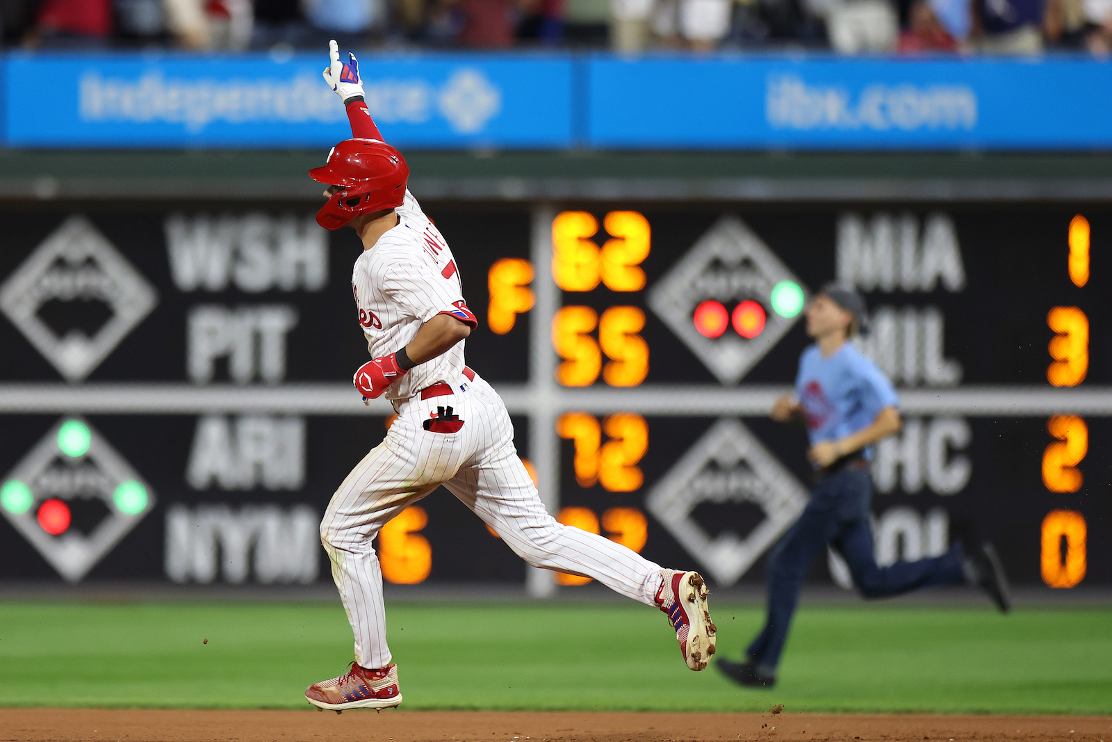 Trea Turner rounds the bases after hitting a home run