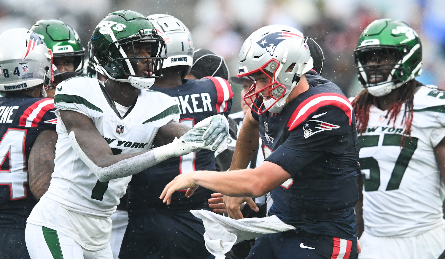 EAST RUTHERFORD, NJ - SEPTEMBER 24: Sauce Gardner #1 of the New York Jets pushes Mac Jones #10 of the New England Patriots during the second half at MetLife Stadium on September 24, 2023 in East Rutherford, New Jersey. (Photo by Kathryn Riley/Getty Images)