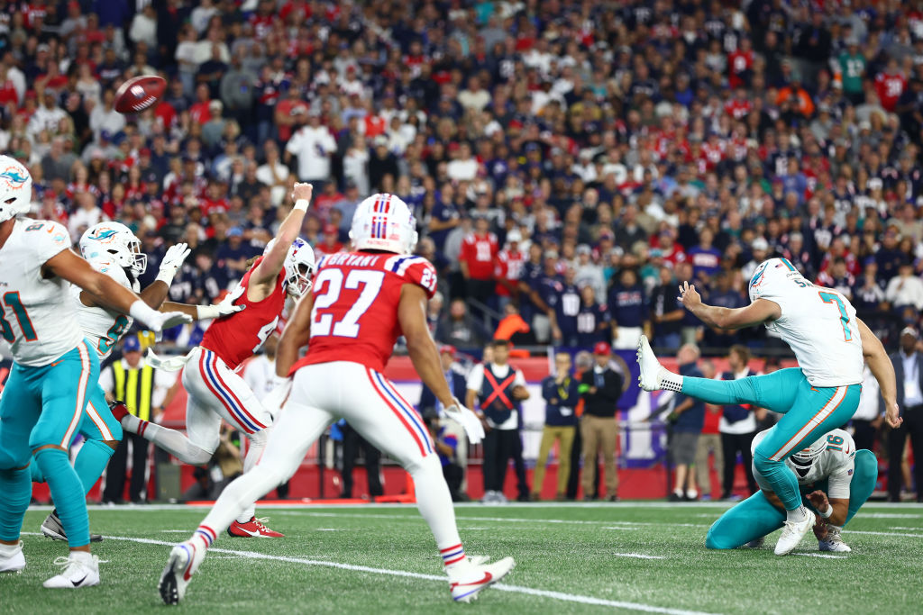 Jason Sanders has his field goal attempt blocked by Brenden Schooler
