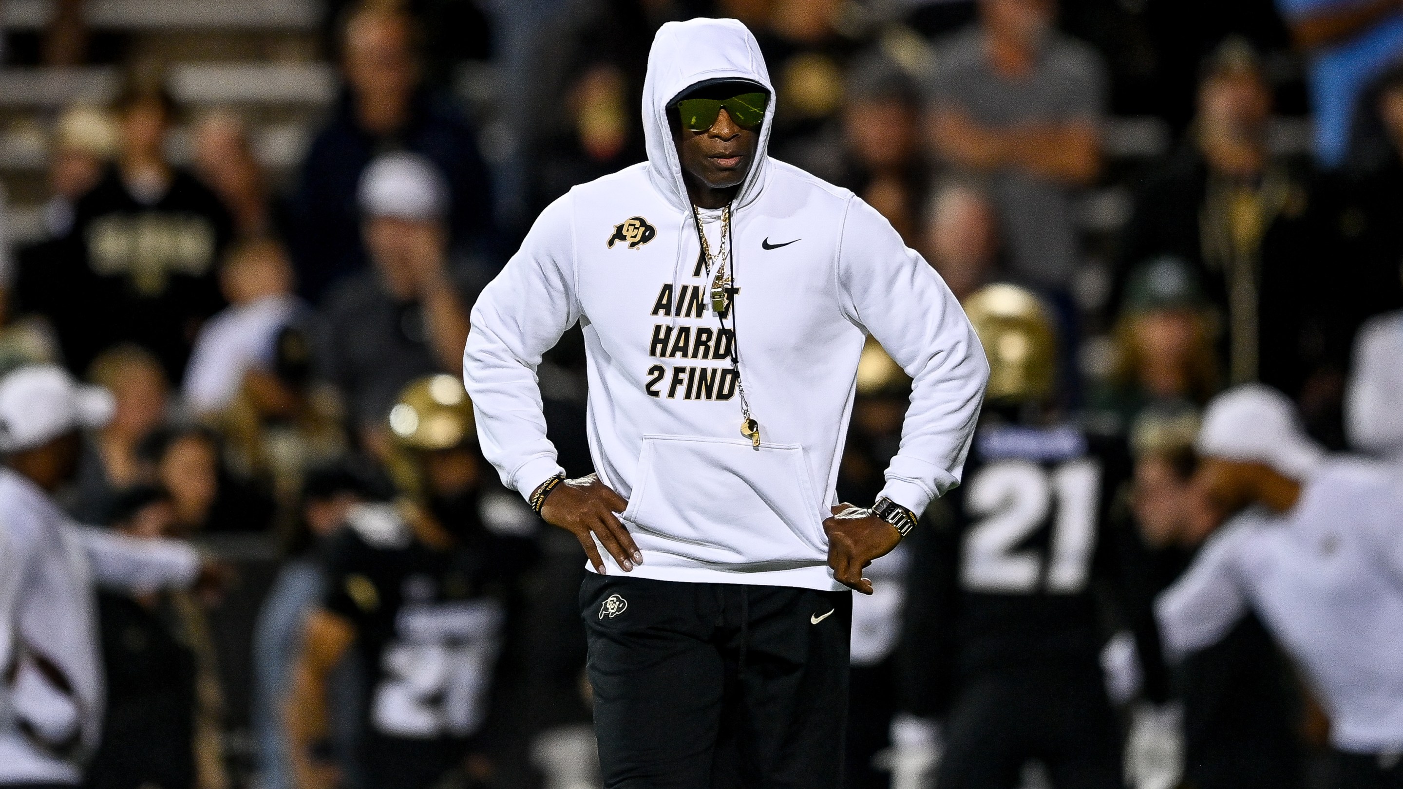 Head coach Deion Sanders of the Colorado Buffaloes walks on the field as players warm up before a game against the Colorado State Rams at Folsom Field on September 16, 2023 in Boulder, Colorado.