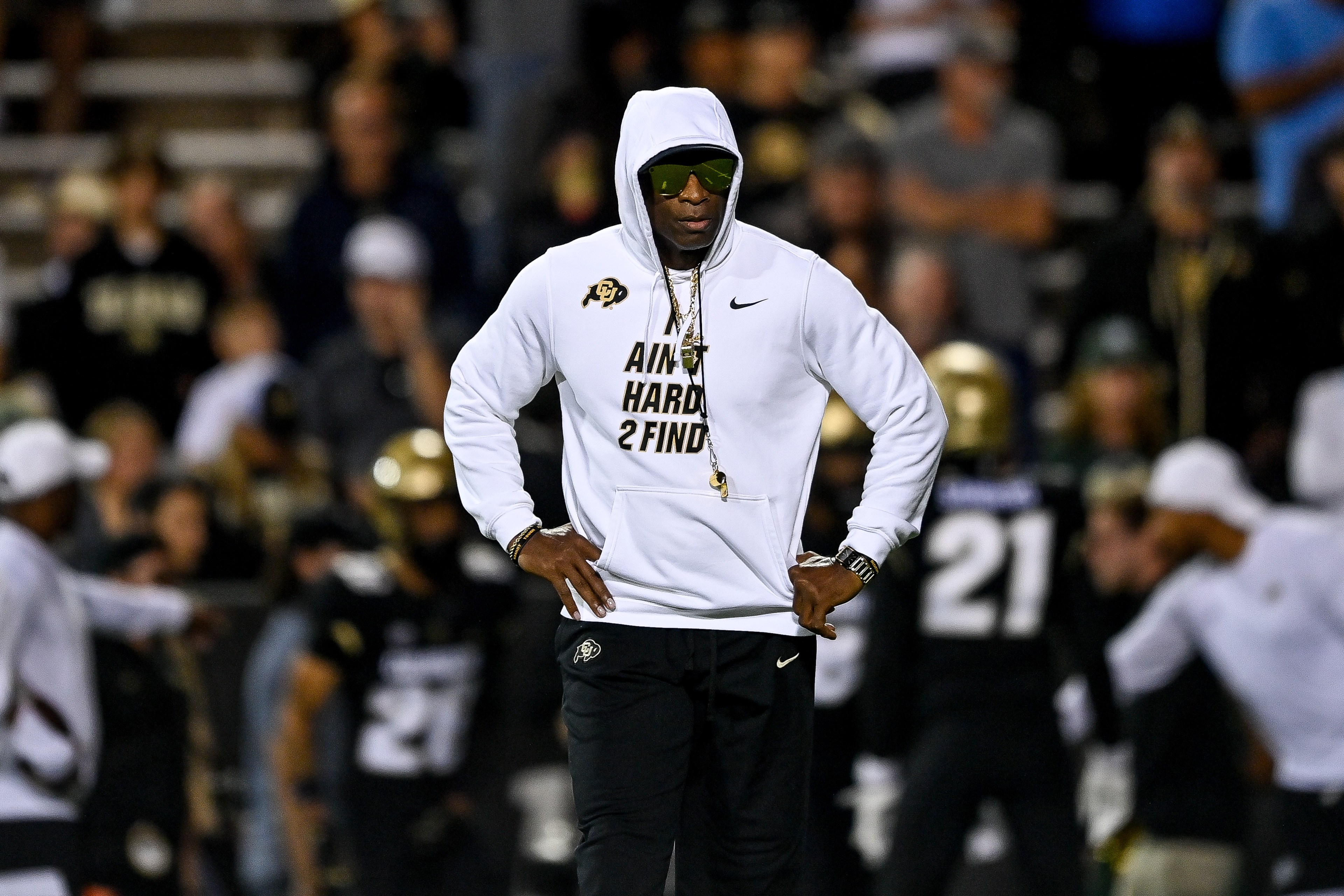 Head coach Deion Sanders of the Colorado Buffaloes walks on the field as players warm up before a game against the Colorado State Rams at Folsom Field on September 16, 2023 in Boulder, Colorado.