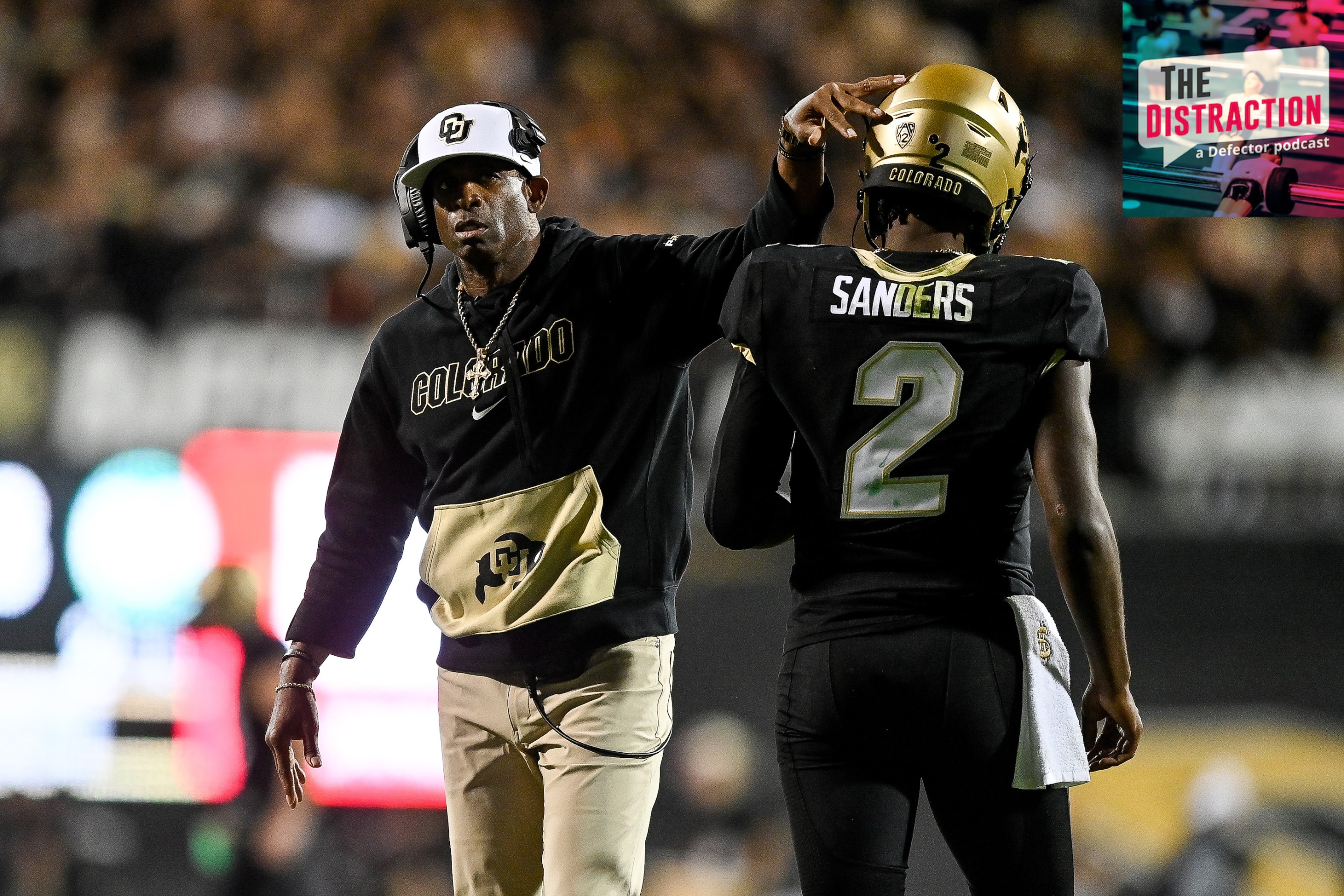 Colorado head coach Deion Sanders congratulates his son Shadeur during Colorado's win against Colorado State on September 16, 2023.