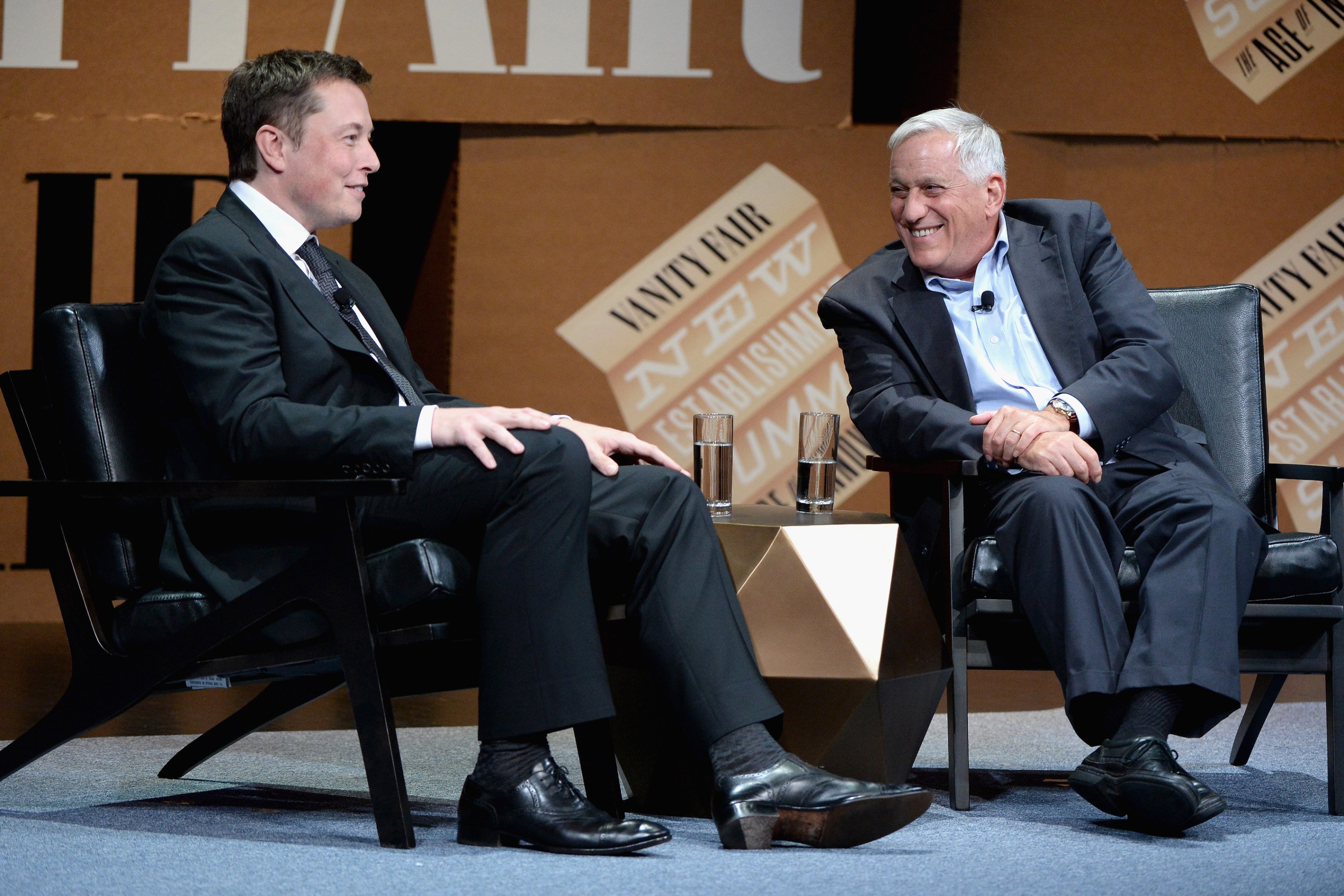 Walter Isaacson (right) and Elon Musk (left) speak onstage at the Vanity Fair New Establishment Summit back in 2014, long before Isaacson wrote a big biography of Musk.