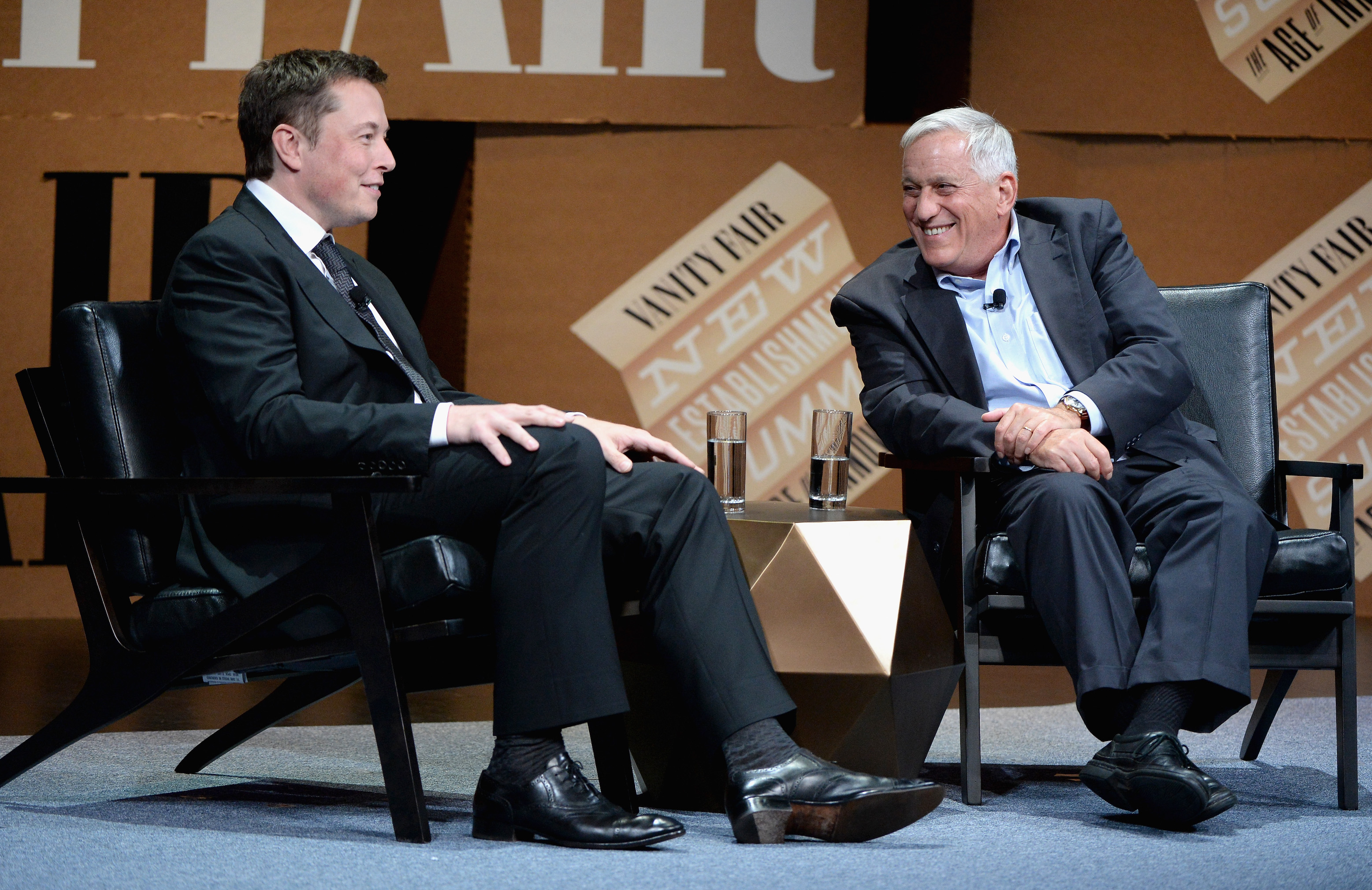 Walter Isaacson (right) and Elon Musk (left) speak onstage at the Vanity Fair New Establishment Summit back in 2014, long before Isaacson wrote a big biography of Musk.