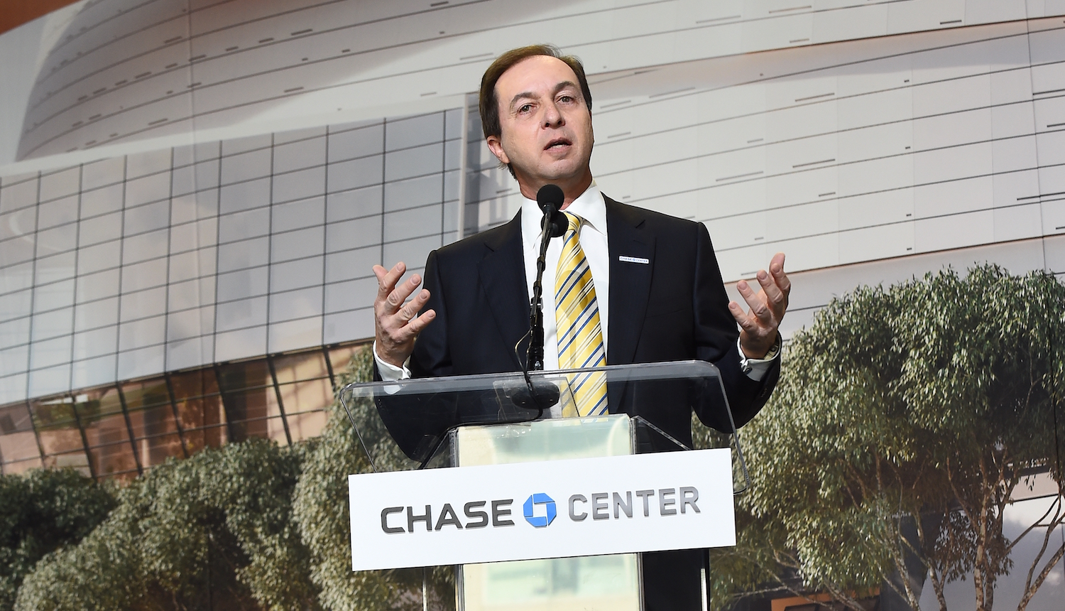OAKLAND, CA - JANUARY 17: Joe Lacob of the Golden State Warriors speaks to the crowd during the Golden State Warriors Chase Arena groundbreaking ceremony on January 17, 2017 in Oakland, California. NOTE TO USER: User expressly acknowledges and agrees that, by downloading and or using this photograph, user is consenting to the terms and conditions of Getty Images License Agreement. Mandatory Copyright Notice: Copyright 2017 NBAE (Photo by Noah Graham/NBAE via Getty Images)