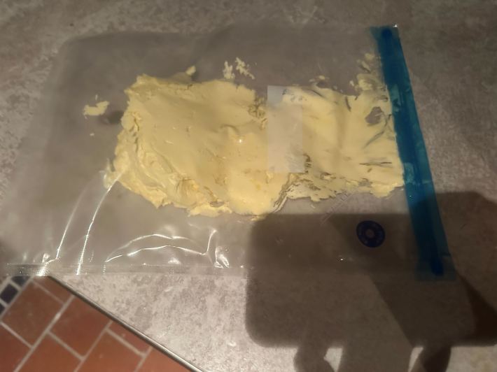 Kelsey's crème au beurre sits inside a zipper food storage bag.