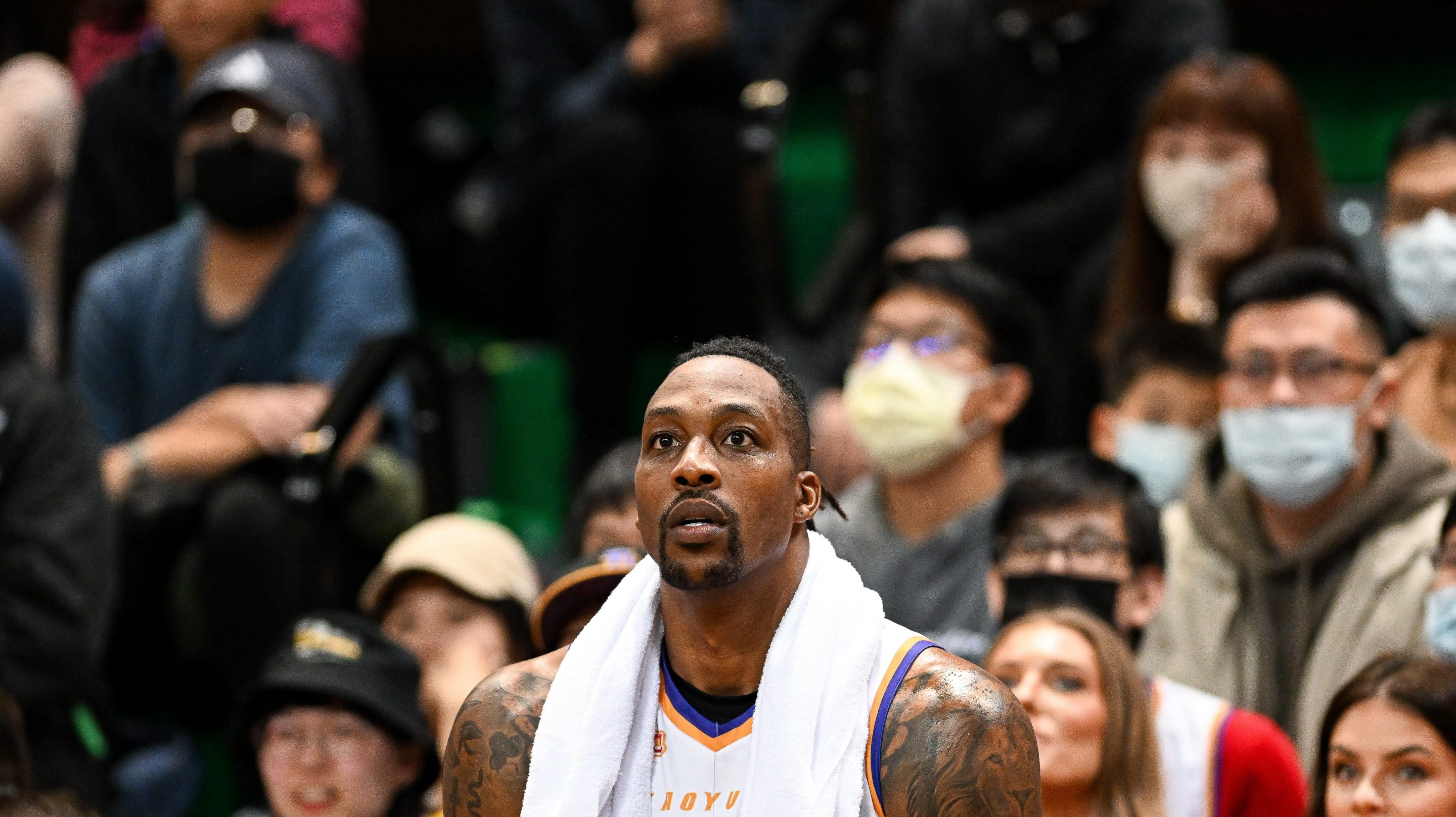 Center Dwight Howard #12 of the Taoyuan Leopards reacts at the courtside during the T1 League game between TaiwanBeer HeroBears and Taoyuan Leopards at University of Taipei Tianmu Gymnasium on February 19, 2023 in Taipei, Taiwan.