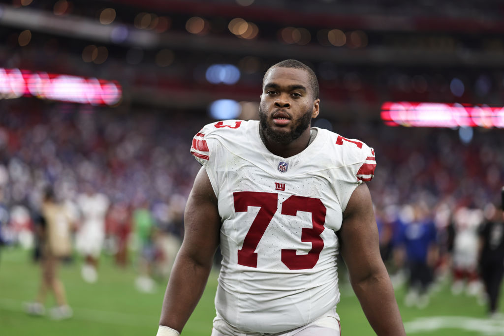 Evan Neal #73 of the New York Giants looks on following an NFL football game between the Arizona Cardinals and the New York Giants at State Farm Stadium on September 17, 2023 in Glendale, Arizona.