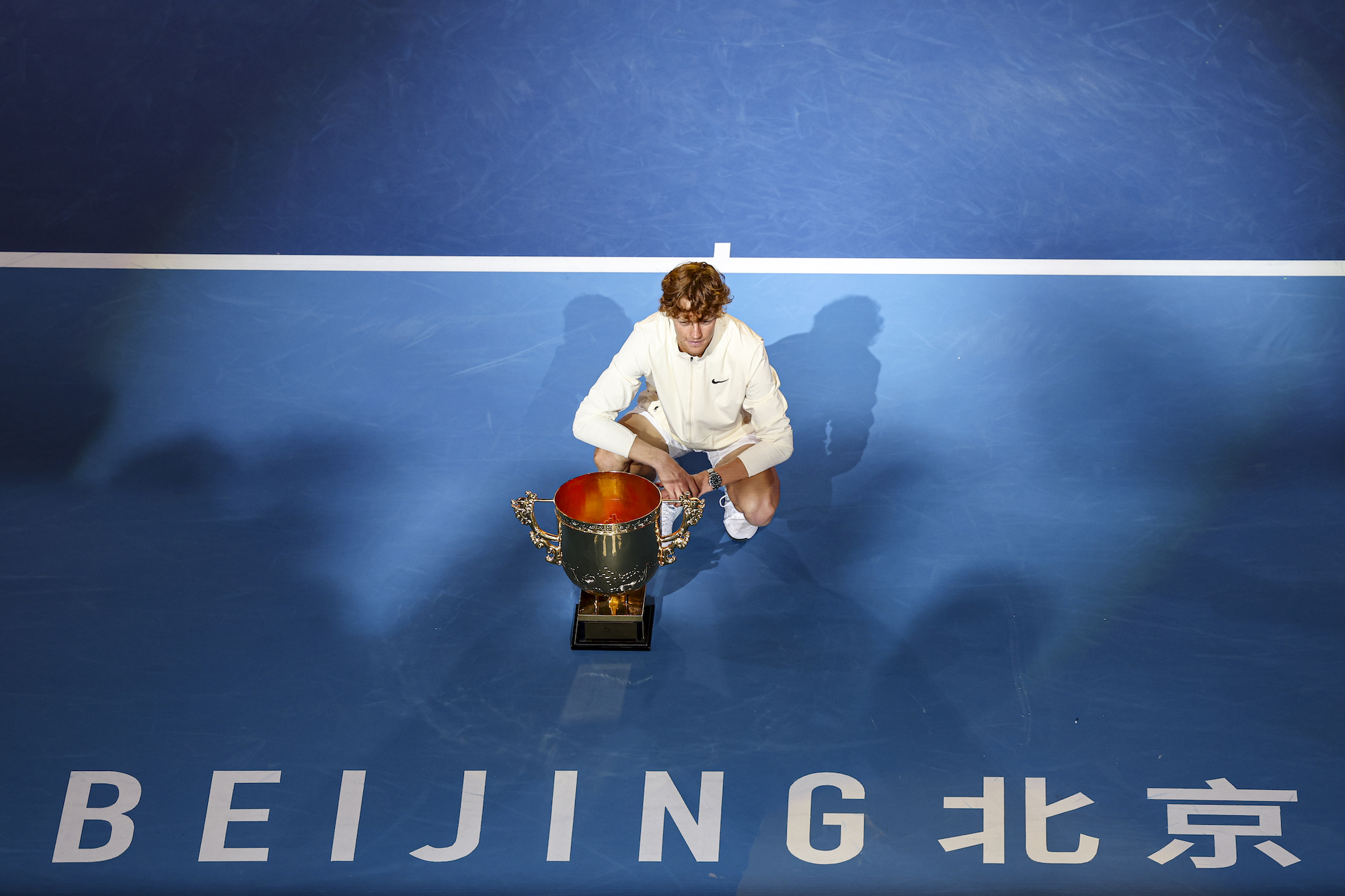 Jannik Sinner poses with the China Open trophy