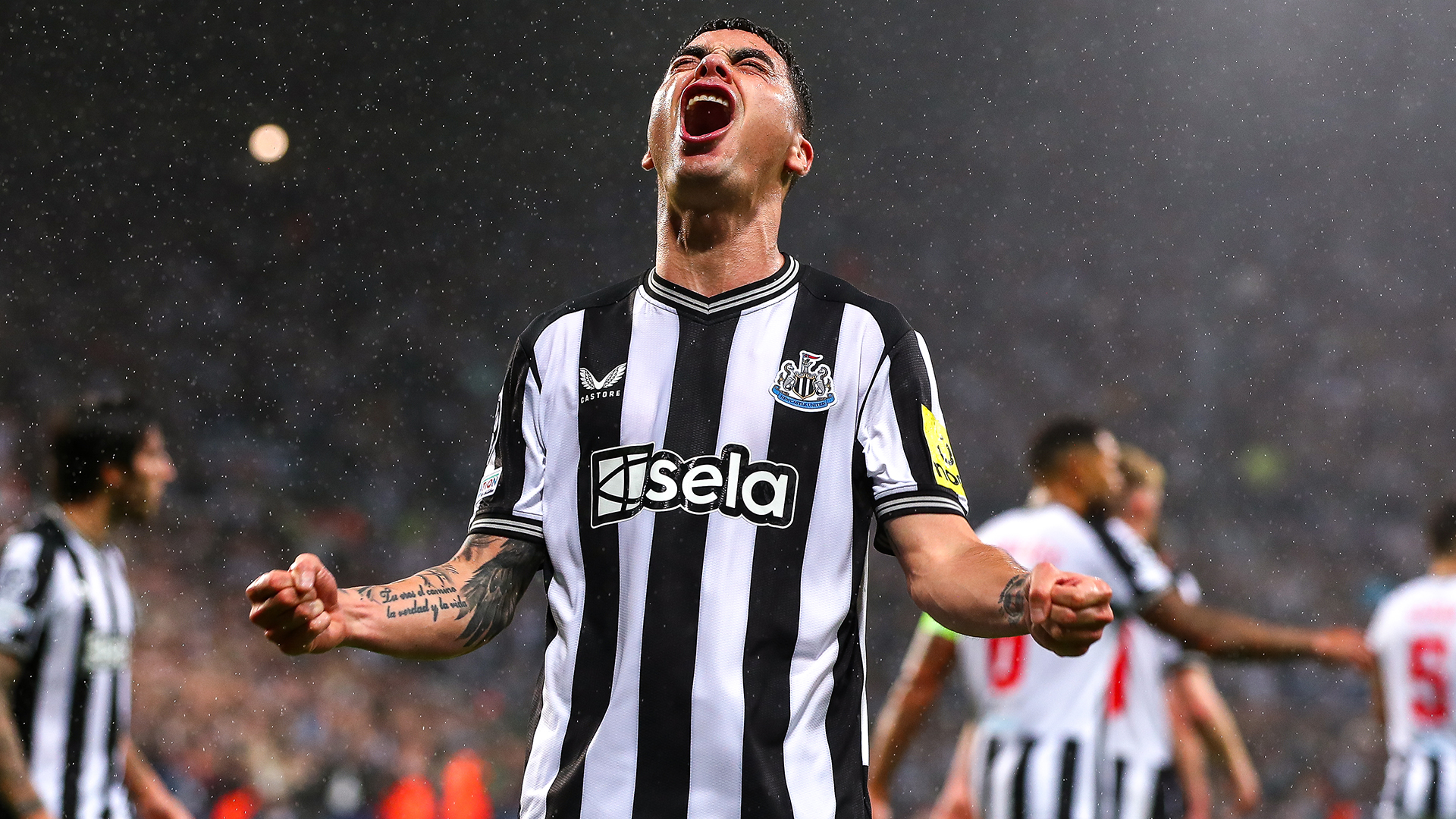 Miguel Almiron of Newcastle United celebrates after scoring his team's first goal during the UEFA Champions League match between Newcastle United FC and Paris Saint-Germain at St. James Park on October 4, 2023 in Newcastle upon Tyne, United Kingdom.