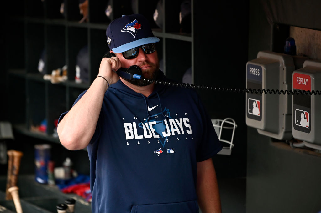 John Schneider #14 of the Toronto Blue Jays looks on prior to Game One of the Wild Card Series against the Minnesota Twins at Target Field on October 03, 2023 in Minneapolis, Minnesota.