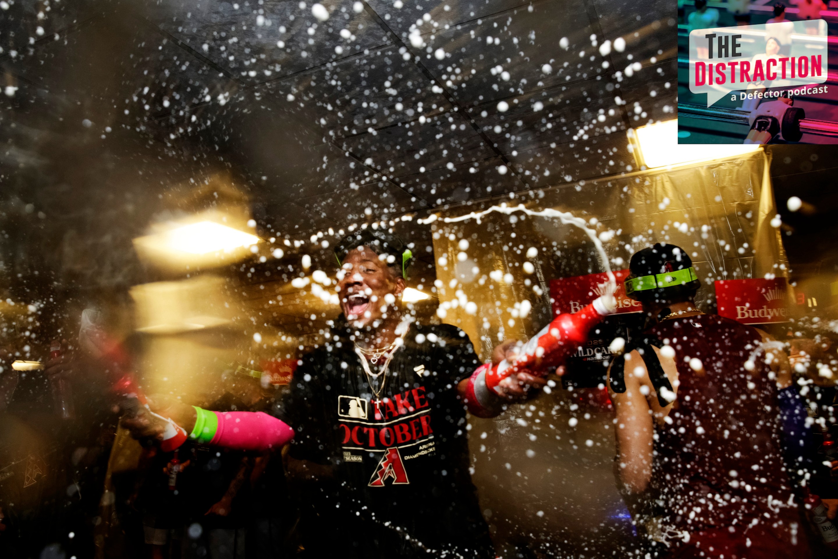 Geraldo Perdomo of the Arizona Diamondbacks celebrates by splashing to beers around after Arizona completed their two-game Wild Card sweep of the Brewers in October of 2023.