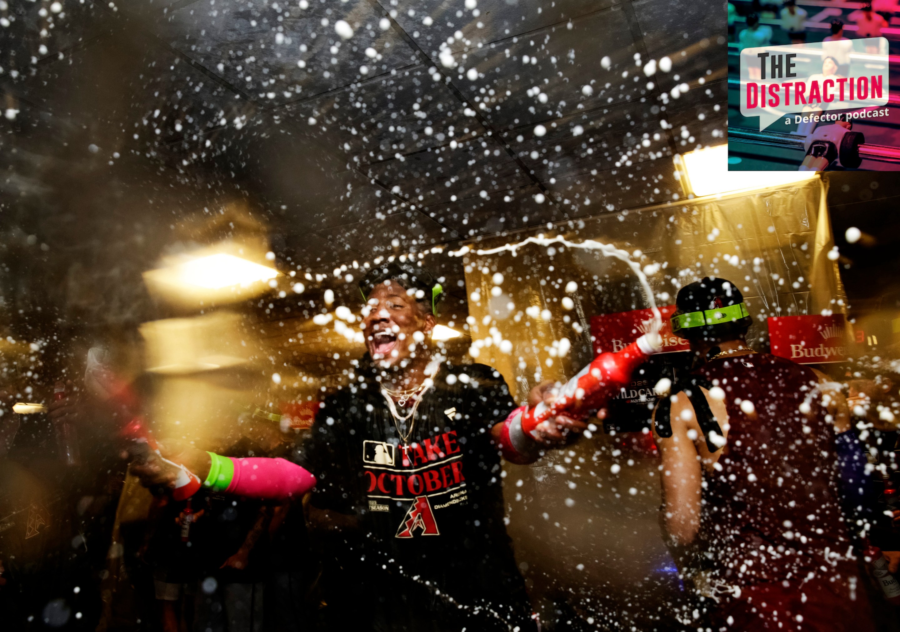 Geraldo Perdomo of the Arizona Diamondbacks celebrates by splashing to beers around after Arizona completed their two-game Wild Card sweep of the Brewers in October of 2023.