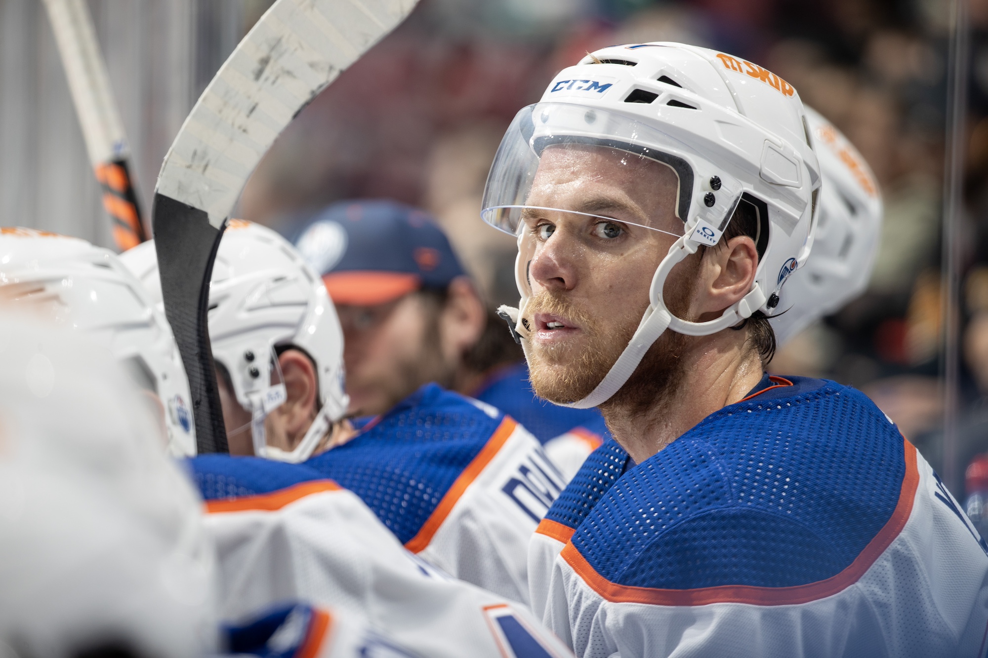 VANCOUVER, CANADA - OCTOBER 11: Connor McDavid #97 of the Edmonton Oilers looks onto the ice dejected during the second period of their NHL game against the Vancouver Canucks at Rogers Arena October 11, 2023 in Vancouver, British Columbia, Canada. (Photo by Jeff Vinnick/NHLI via Getty Images)