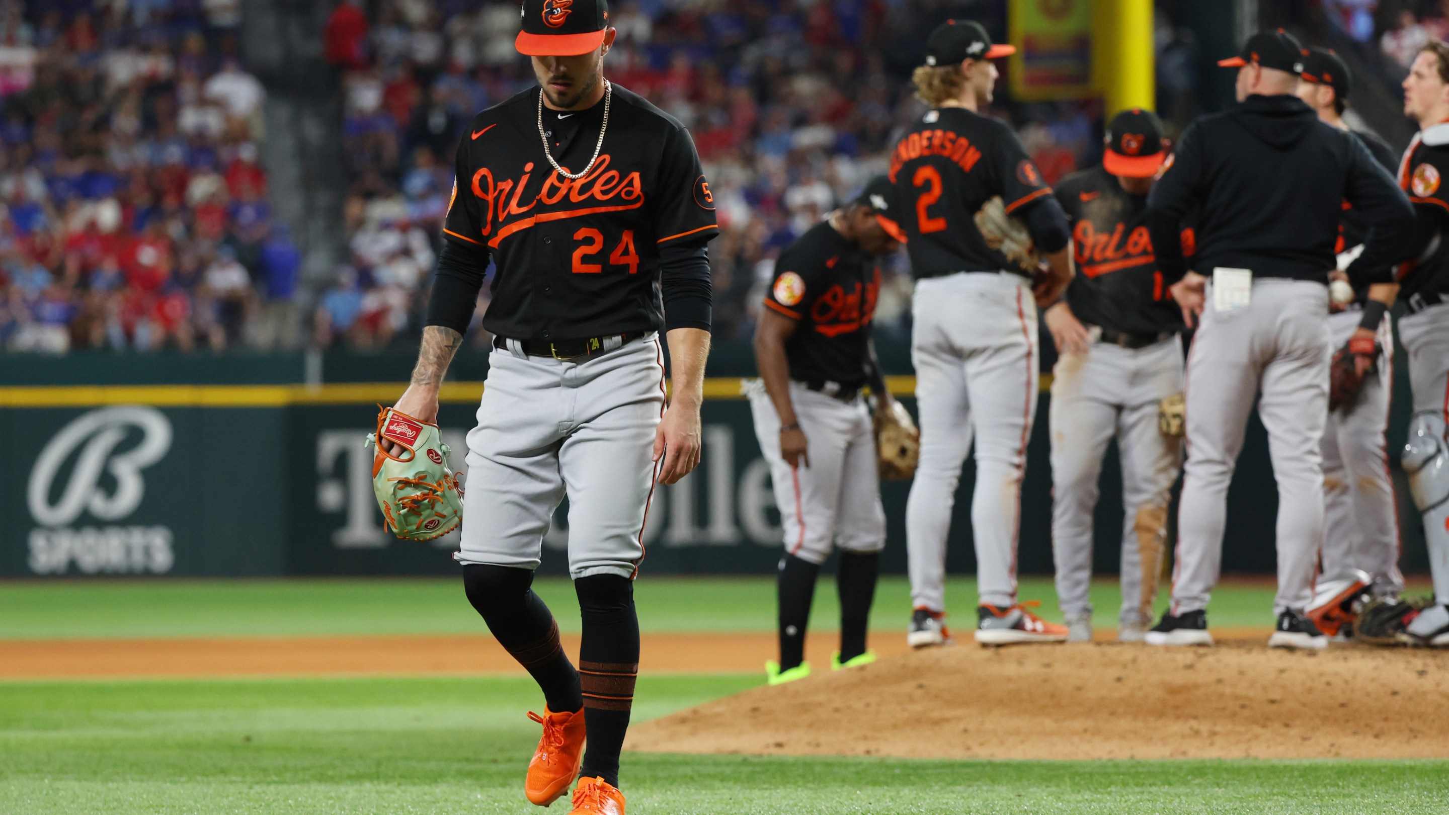 Orioles reliever DL Hall leaves the mound while his teammates wait for the reliever who will relieve him during the team's Game 3 loss in the American League Divisional Series.