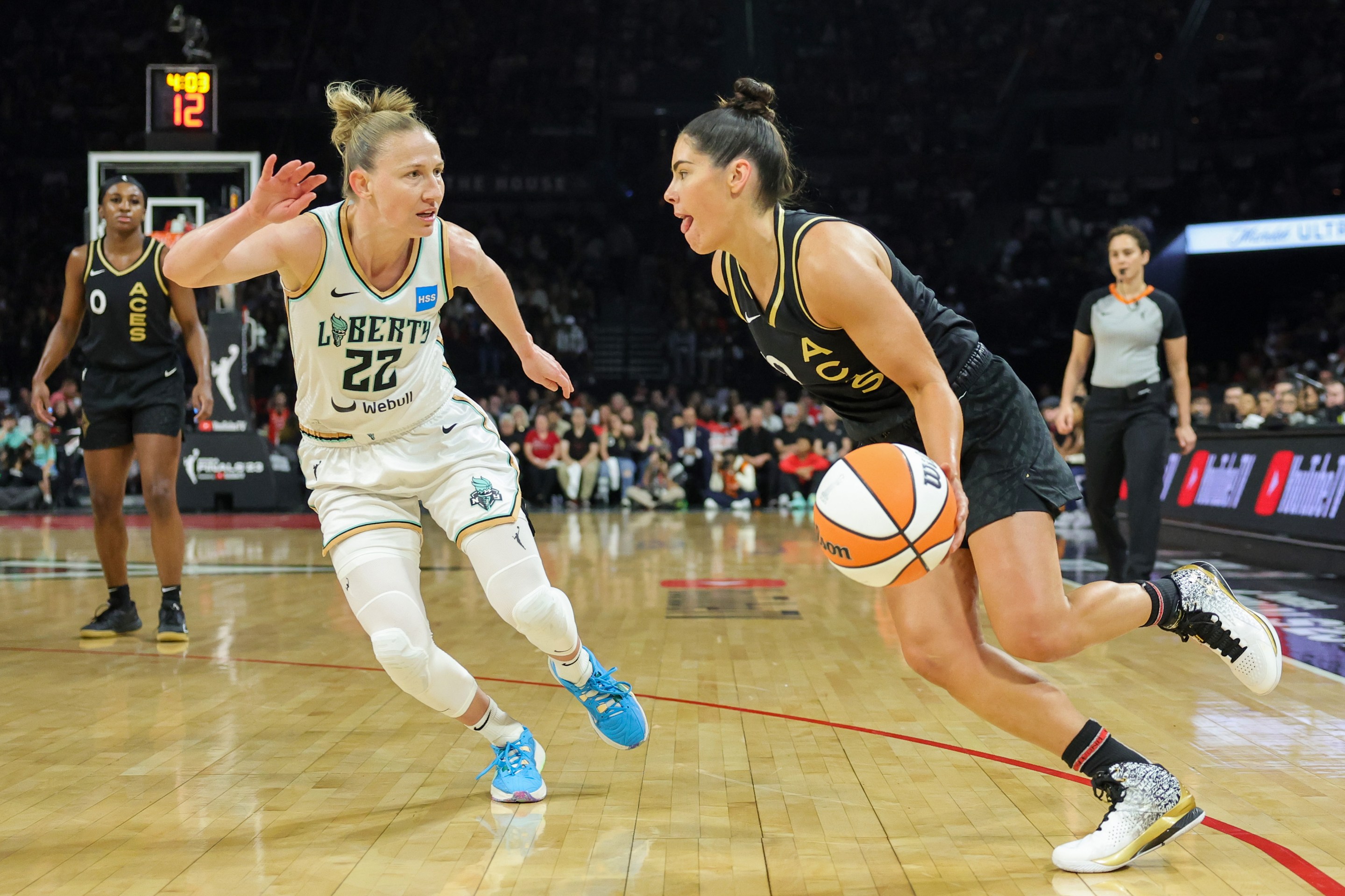 Kelsey Plum #10 of the Las Vegas Aces drives against Courtney Vandersloot #22 of the New York Liberty in the first quarter of Game Two of the 2023 WNBA Playoffs finals at Michelob ULTRA Arena on October 11, 2023 in Las Vegas, Nevada.