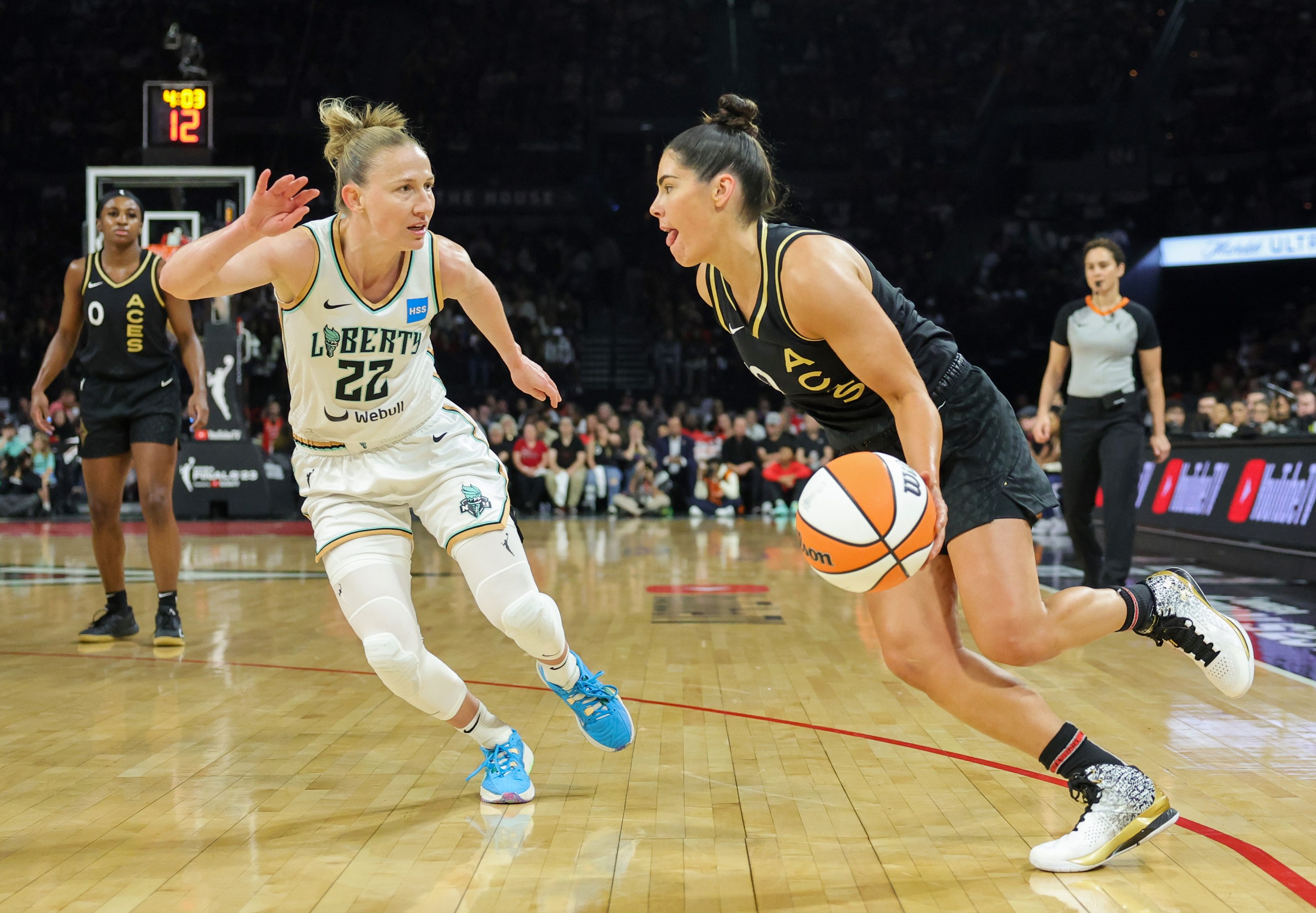 Kelsey Plum #10 of the Las Vegas Aces drives against Courtney Vandersloot #22 of the New York Liberty in the first quarter of Game Two of the 2023 WNBA Playoffs finals at Michelob ULTRA Arena on October 11, 2023 in Las Vegas, Nevada.