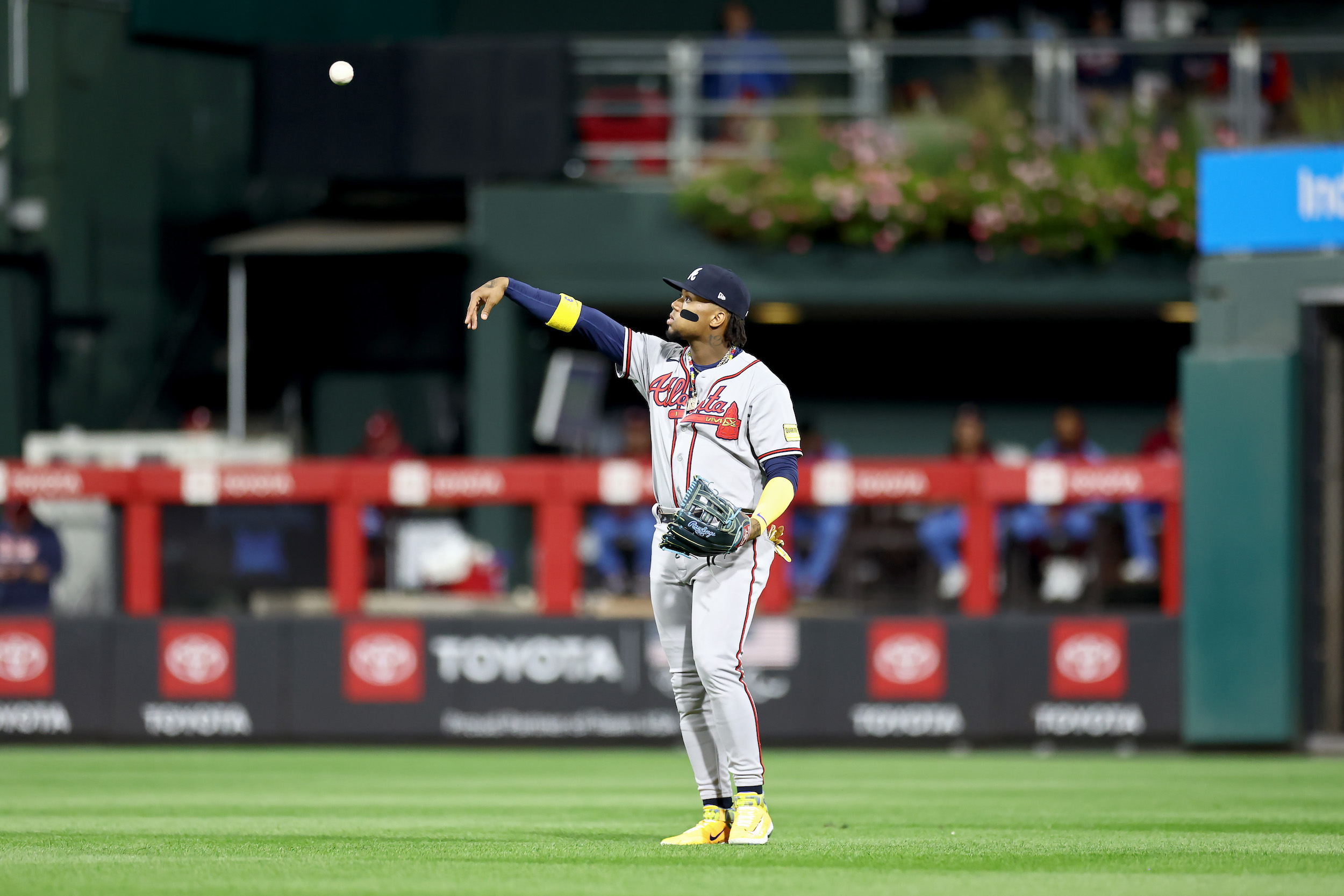 Ronald Acuña Jr. throws the ball back into the infield during Game 4 of the NLDS.