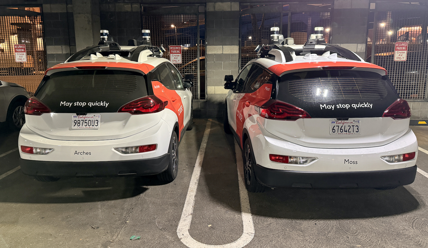 SAN FRANCISCO, CALIFORNIA - OCTOBER 24: 'Cruise' driverless robot taxis are seen at a parking lot as California Department of Motor Vehicles (DMV) revokes its self-driving car permit and citing 'unreasonable risk to public safety' in San Francisco, California, USA on October 24, 2023. The self-driving service of 'Cruise', the autonomous vehicle company owned by General Motor, is thought to be a step towards wider commercial deployment of a long-promised autonomous alternative to ride-hailing services such as Uber or Lyft in the US. (Photo by Tayfun Coskun/Anadolu via Getty Images)