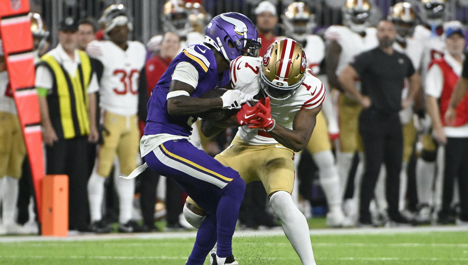 MINNEAPOLIS, MINNESOTA - OCTOBER 23: Jordan Addison #3 of the Minnesota Vikings catches a first half touchdown against Charvarius Ward #7 of the San Francisco 49ers at U.S. Bank Stadium on October 23, 2023 in Minneapolis, Minnesota. (Photo by Stephen Maturen/Getty Images)