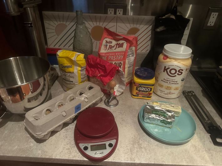 Kelsey's ingredients gathered on a countertop, with a food scale and a thermometer.
