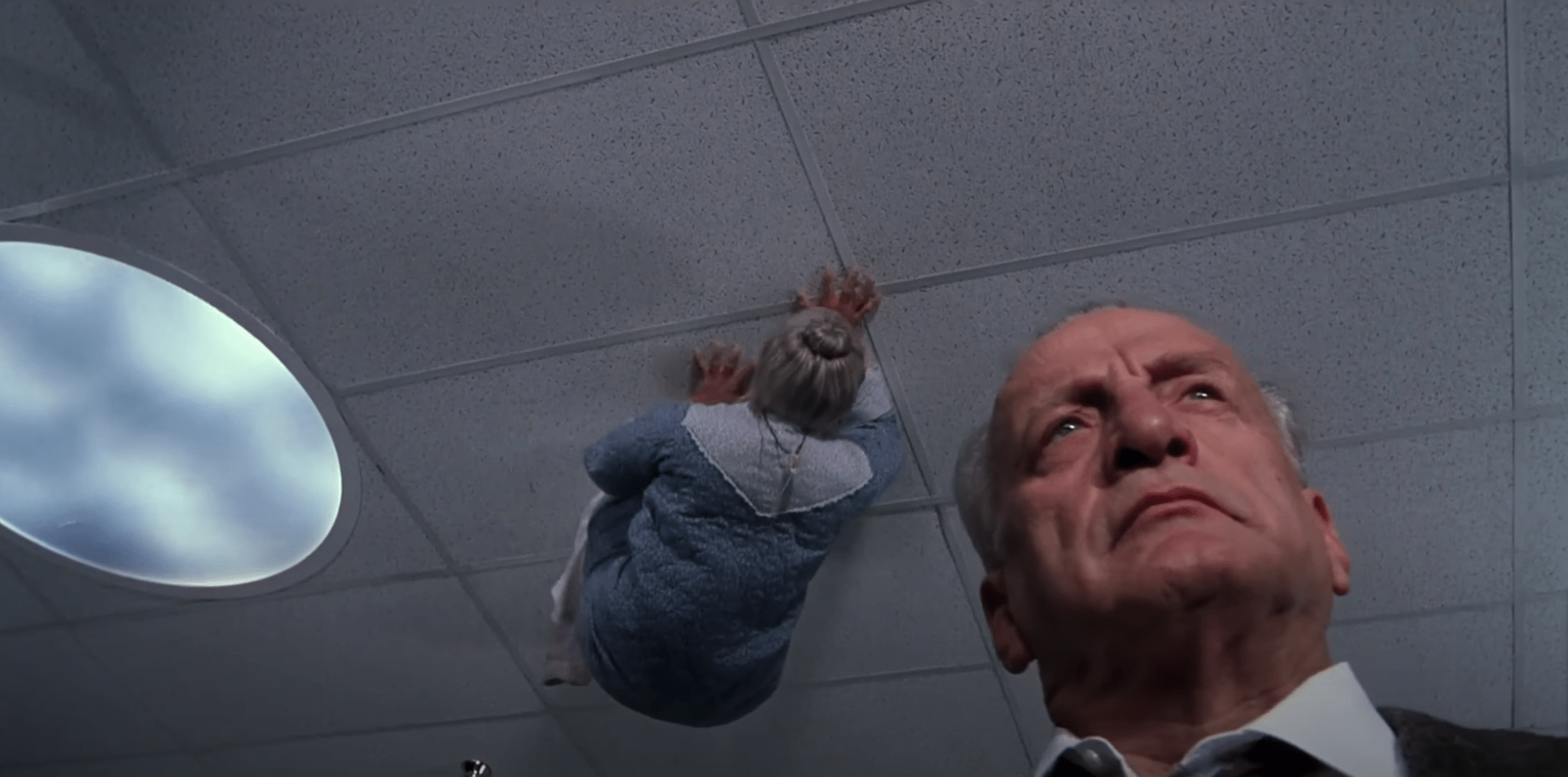 An old lady scampering around on the ceiling of a mental hospital directly above an unaware George C. Scott, in 1990's Exorcist III: Legion.