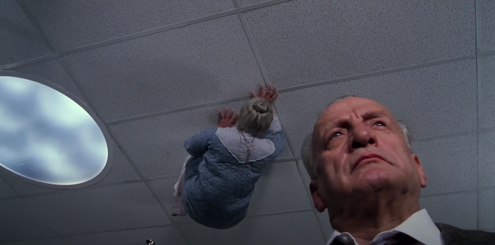 An old lady scampering around on the ceiling of a mental hospital directly above an unaware George C. Scott, in 1990's Exorcist III: Legion.