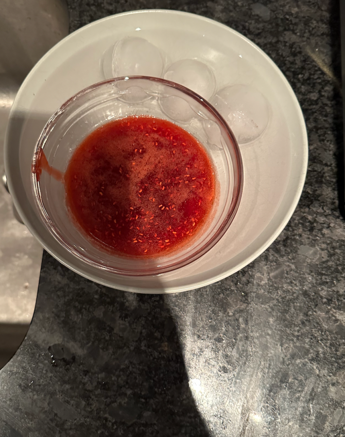 jam inside a glass bowl inside an ice bath