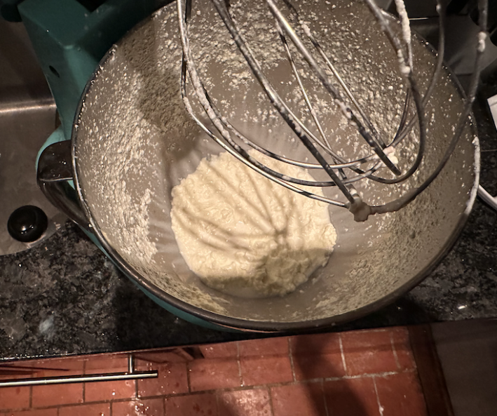 Fully separated cottage cheese-looking shit in a stand mixer.