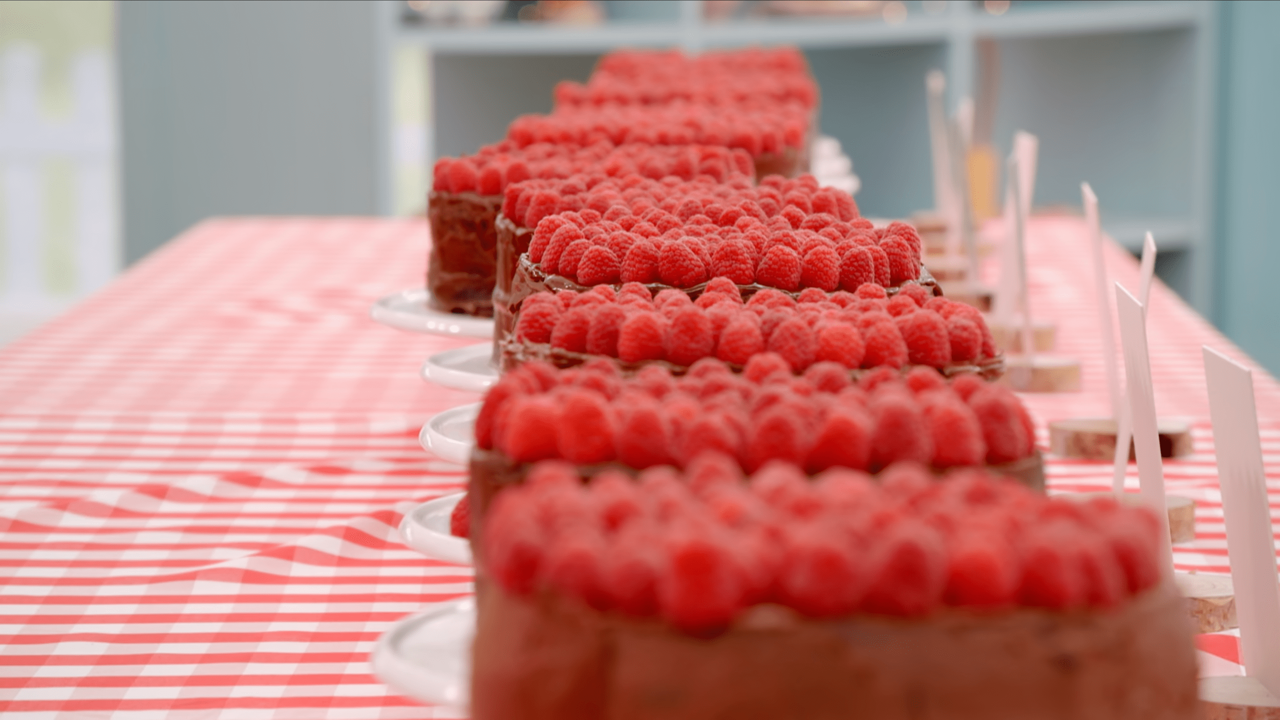 The beautiful raspberry-topped cakes of the show's contestants.