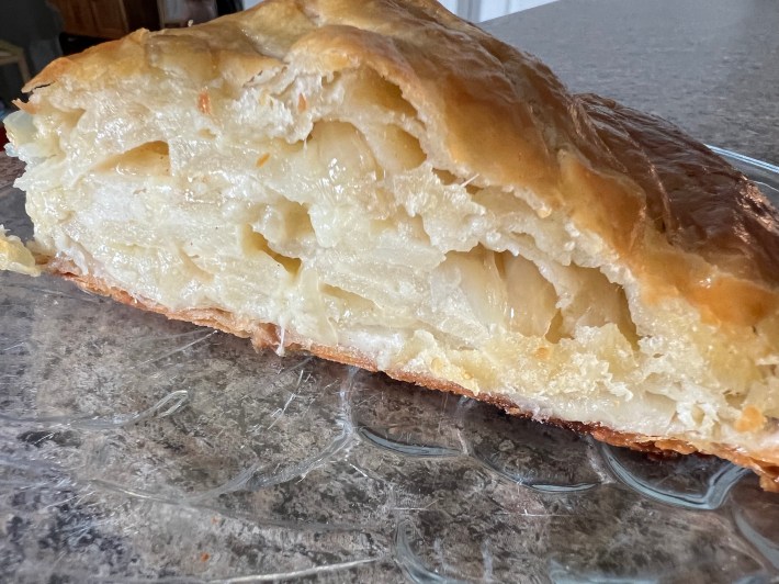A side look at a slice of pithivier.
