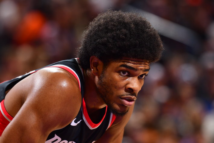 Scoot Henderson of the Portland Trail Blazers catches his breath during a break in preseason action.