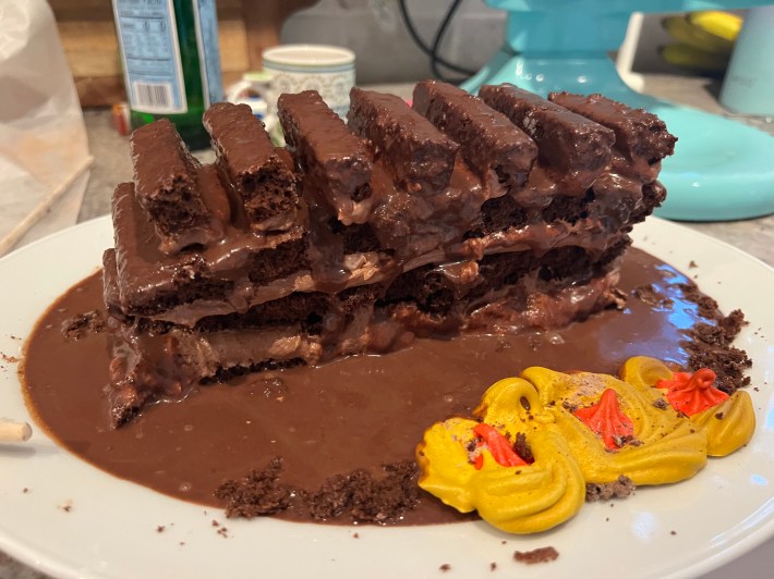 Ganache pooling at the bottom of the plate after pouring right off of the sponged structure.