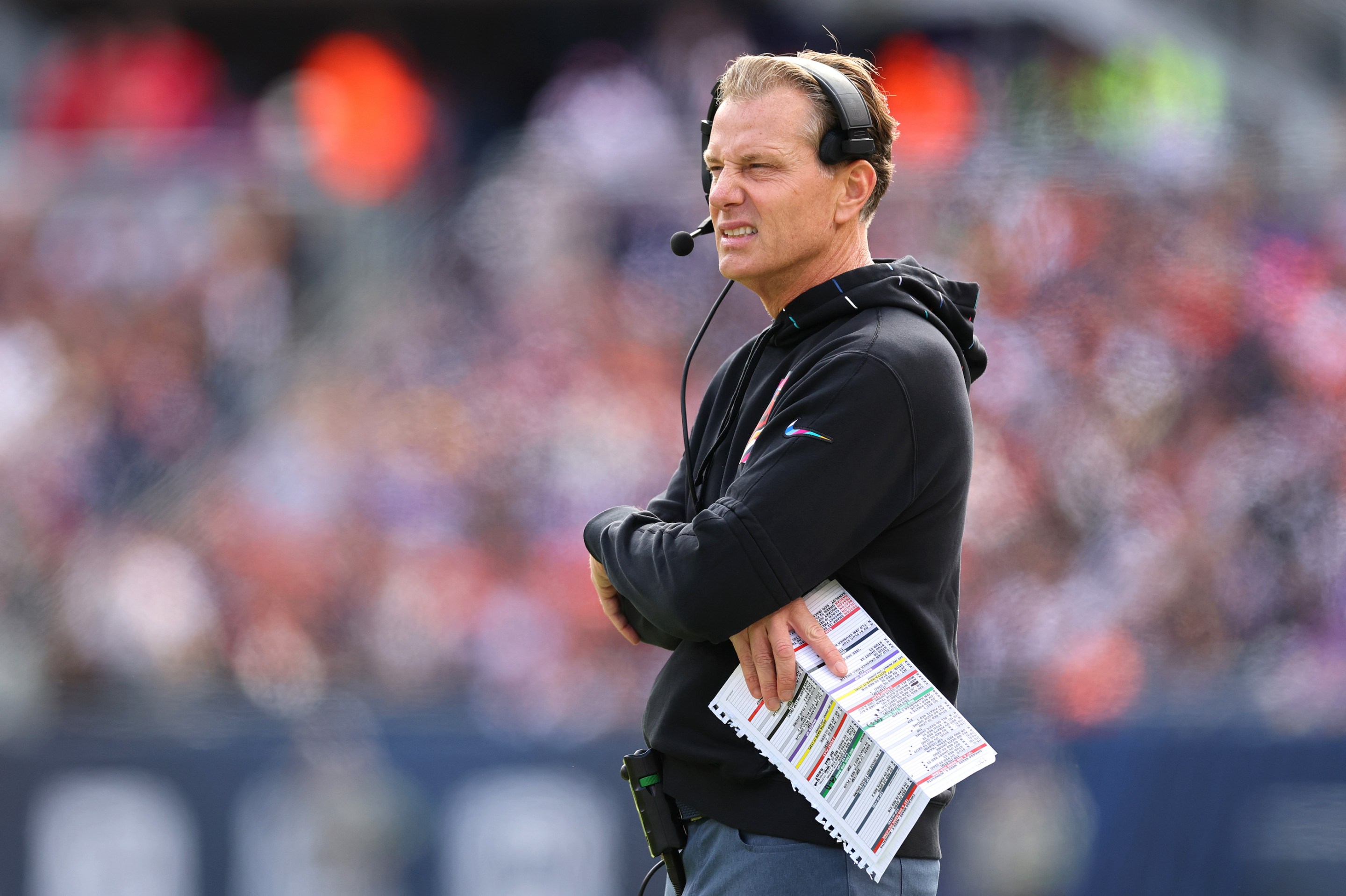 Bears coach Matt Eberflus grimacing in kind of a Popeye style on the sideline at Soldier Field during his team's game against the Vikings.