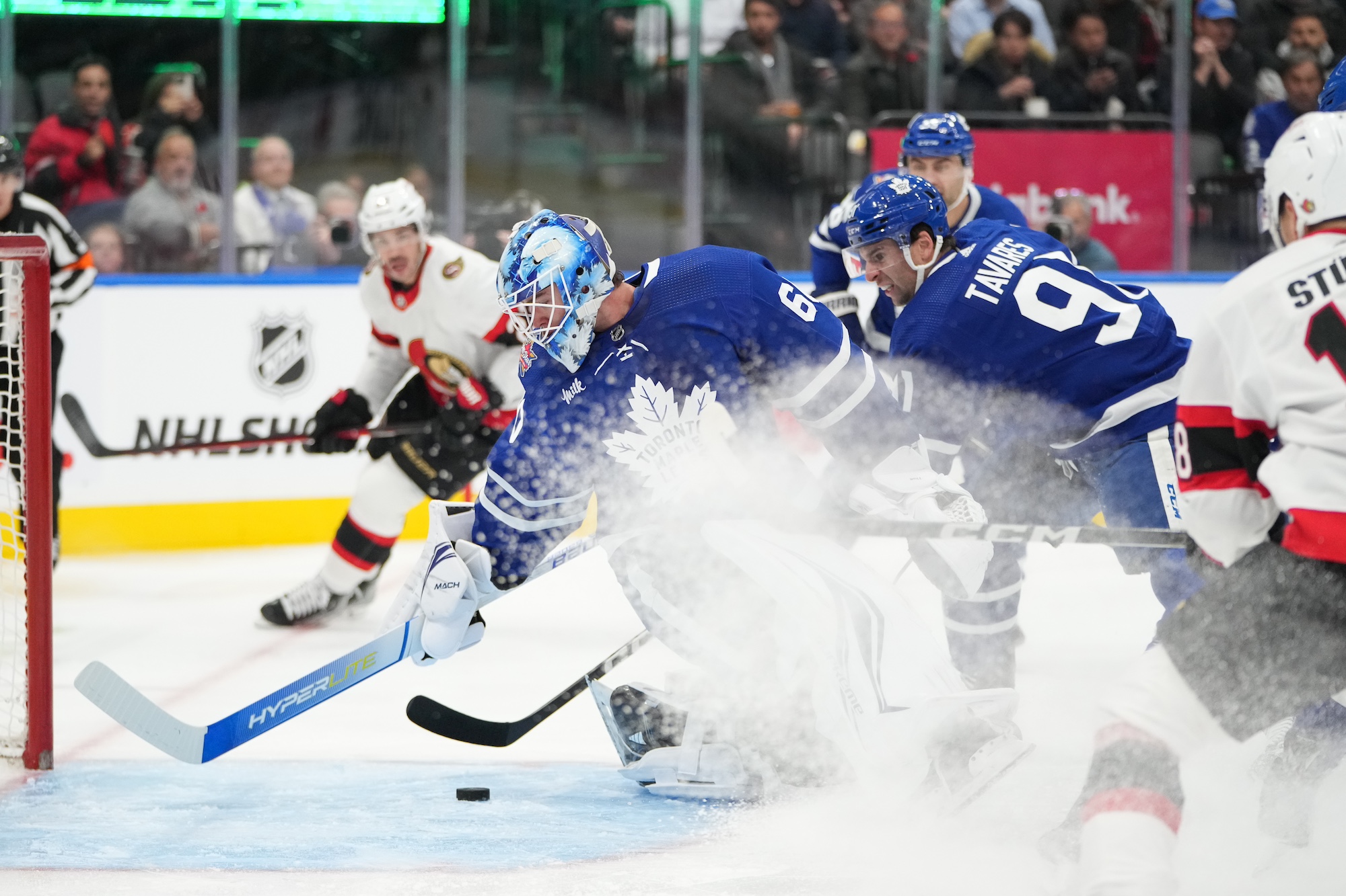 TORONTO, CANADA - NOVEMBER 8: Joseph Woll #60 of the Toronto Maple Leafs reaches for the puck against the Ottawa Senators at Scotiabank Arena on November 8, 2023 in Toronto, Ontario, Canada. (Photo by Michael Chisholm/NHLI via Getty Images)