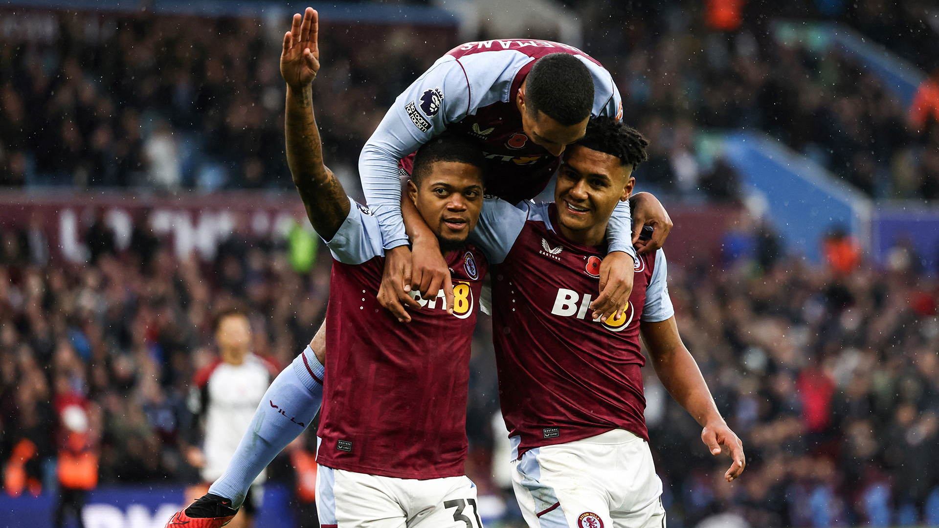 Ollie Watkins (R) celebrates with teammates after scoring his team third goal during the English Premier League football match between Aston Villa and Fulham at Villa Park in Birmingham, central England on November 12, 2023.