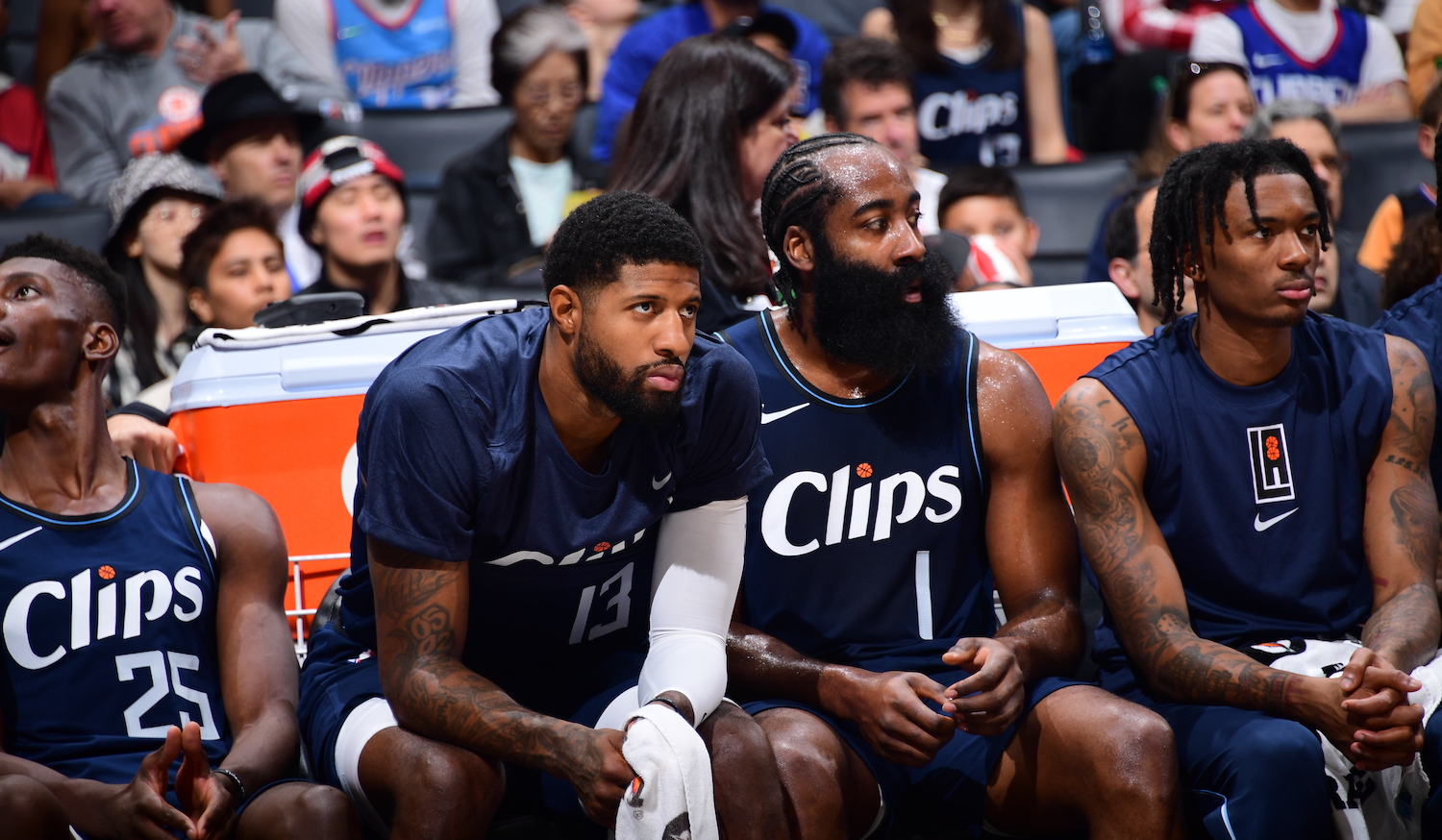 LOS ANGELES, CA - NOVEMBER 12: Paul George #13 of the LA Clippers and James Harden #1 of the LA Clippers look on during the game against the Memphis Grizzlies on November 12, 2023 at Crypto.Com Arena in Los Angeles, California. NOTE TO USER: User expressly acknowledges and agrees that, by downloading and/or using this Photograph, user is consenting to the terms and conditions of the Getty Images License Agreement. Mandatory Copyright Notice: Copyright 2023 NBAE (Photo by Adam Pantozzi/NBAE via Getty Images)