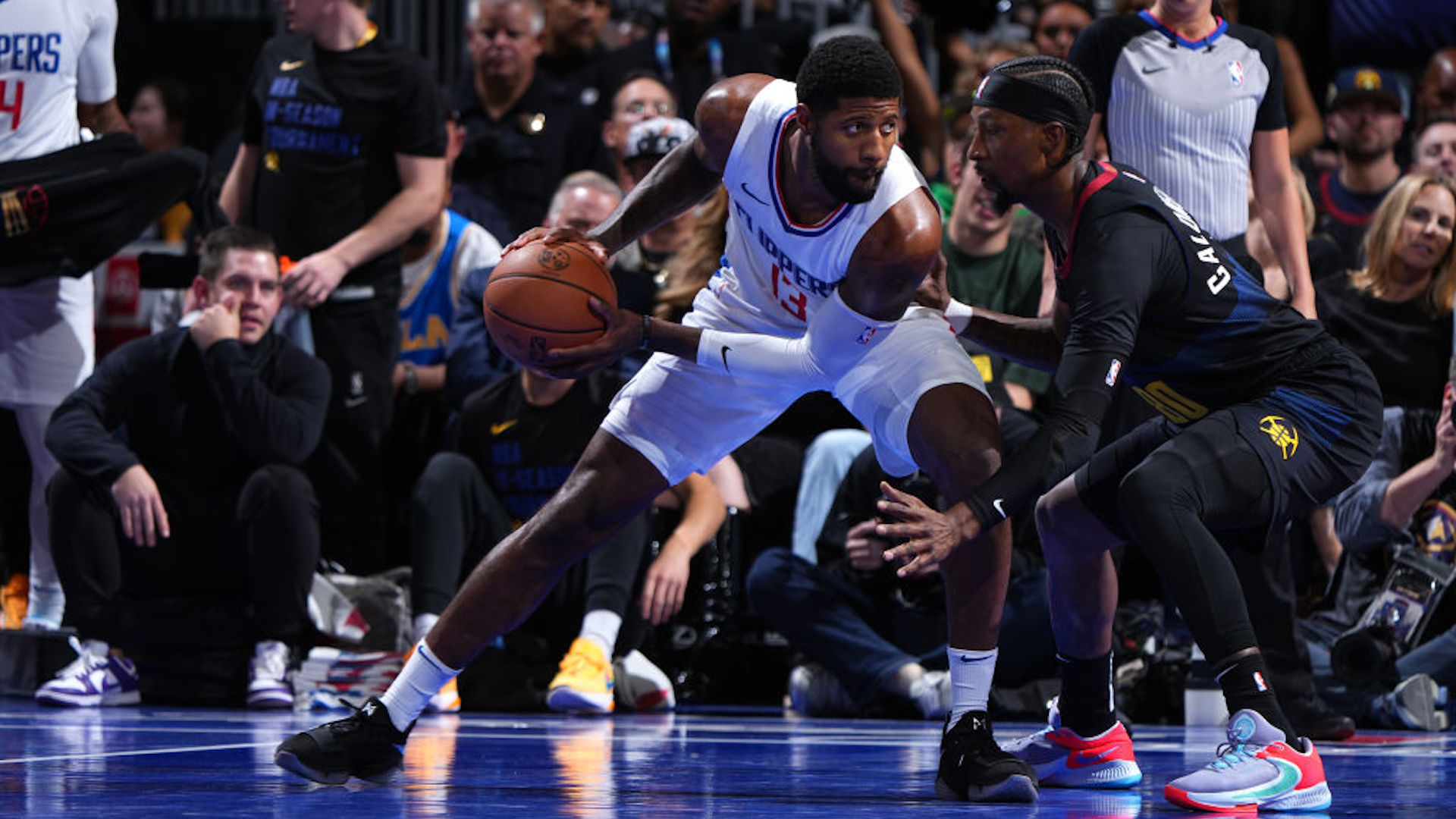 Paul George #13 of the LA Clippers handles the ball during the game against the Denver Nuggets on November 14, 2023 at the Ball Arena in Denver, Colorado.