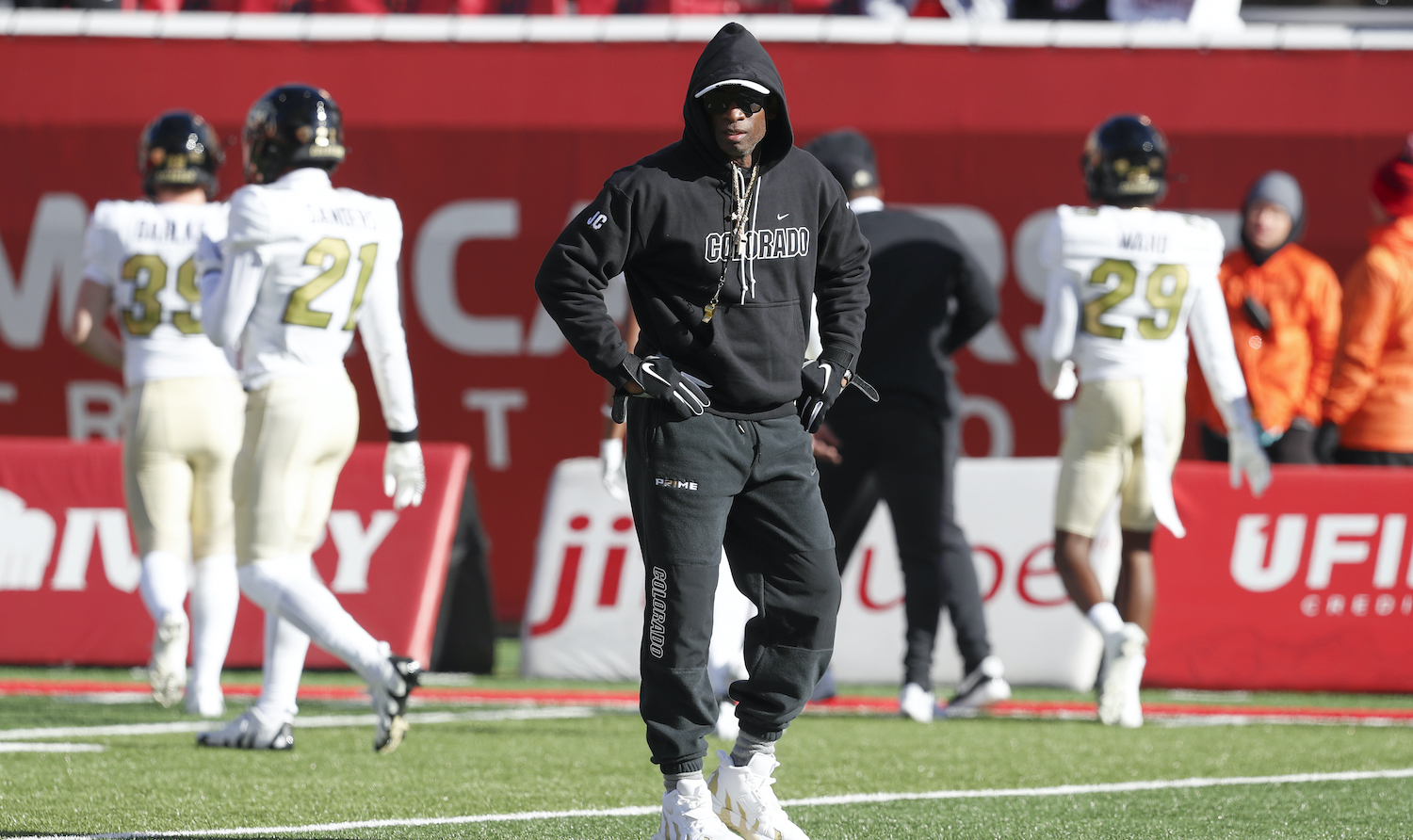 Deion Sanders head coach of the Colorado Buffaloes watches warmups before their game against the Utah Utes at Rice Eccles Stadium on November 25, 2023 in Salt Lake City, Utah. (Photo by Chris Gardner/Getty Images)