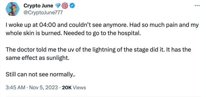 A tweet from user @CryptoJune777 reading: "I woke up at 04:00 and couldn't see anymore. Had so much pain and my whole skin is burned. Needed to go to the hospital. "The doctor told me the uv of the lightning of the stage did it. It has the same effect as sunlight. "Still can not see normally.."