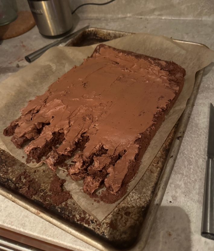 Sponge cake with fingers removed and buttercream.