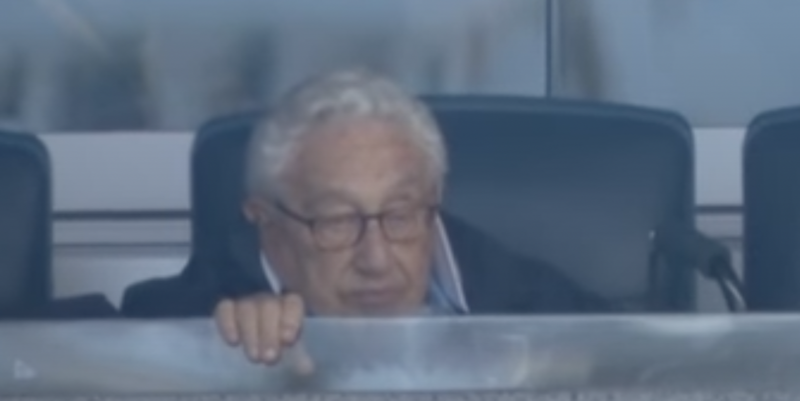 Henry Kissinger looking like a little goblin while watching a Yankees fan