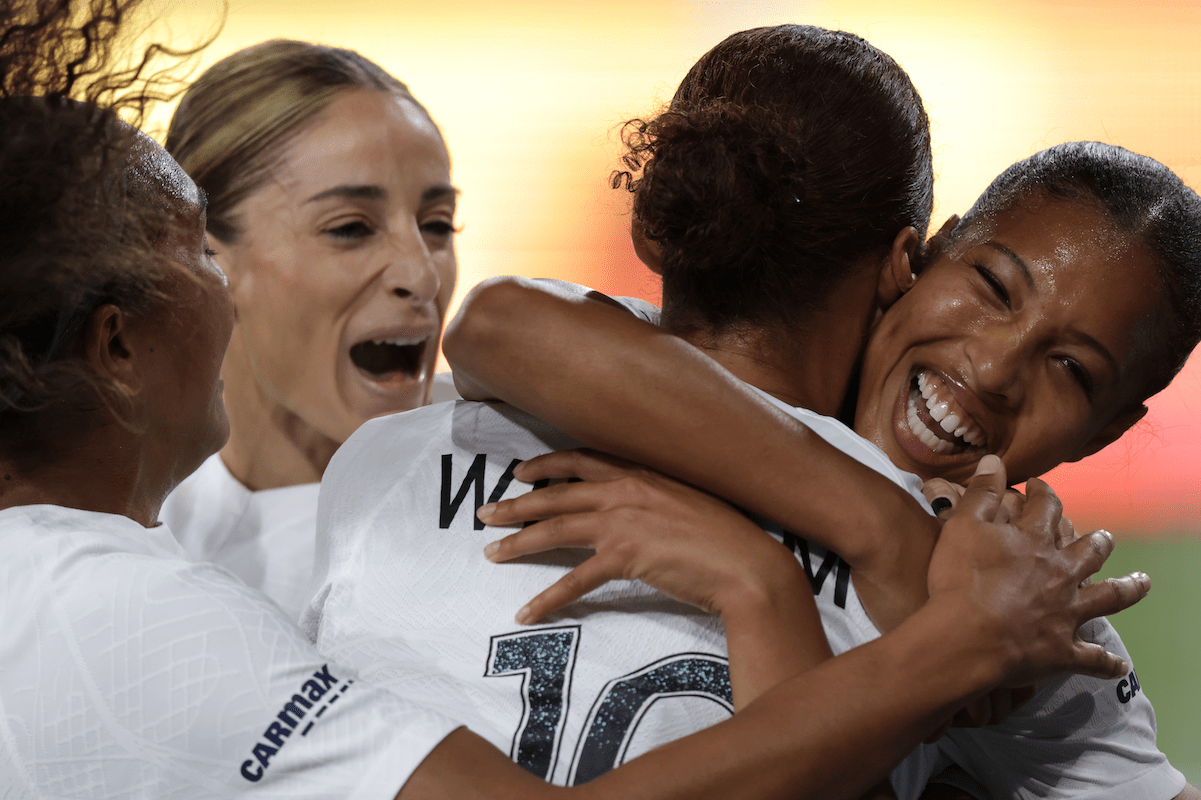 FC Gotham players hug after scoring a goal in the 2023 NWSL Championship game