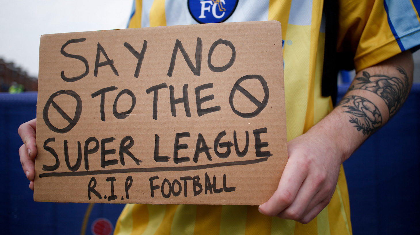 Fans protesting the establishment of the breakaway European Super League demonstrate outside Stamford Bridge stadium, home of Chelsea Football Club, in London, United Kingdom on April 20, 2021. Chelsea is one of six English Premier League clubs to have signed up to the planned midweek competition, announced on Sunday night in defiance of condemnation from football authorities and political leaders including British Prime Minister Boris Johnson and French President Emmanuel Macron.