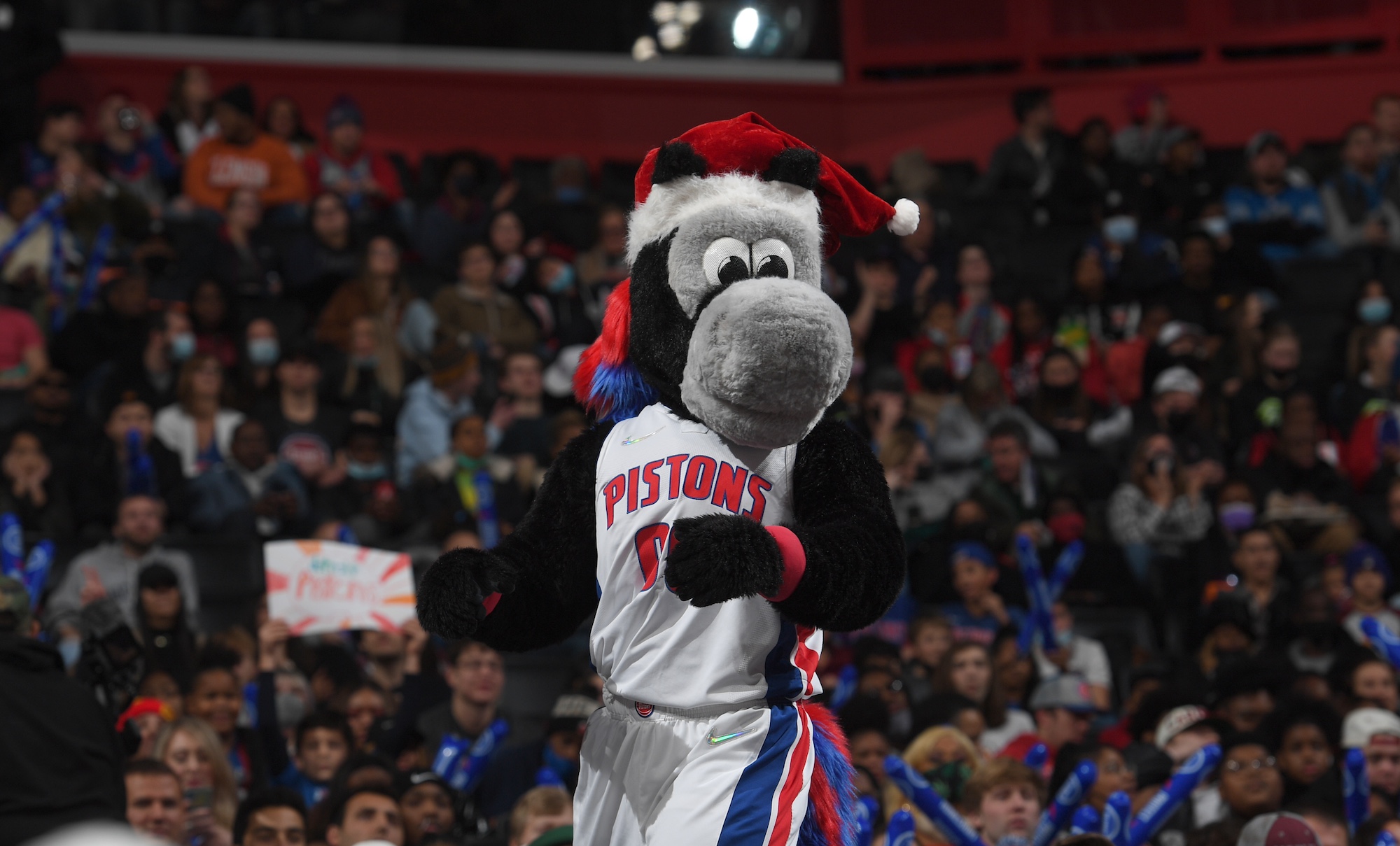 DETROIT, MI - DECEMBER 19: The Detroit Pistons mascot, Hooper, walks the stands during the game against the Miami Heat on December 19, 2021 at Little Caesars Arena in Detroit, Michigan. NOTE TO USER: User expressly acknowledges and agrees that, by downloading and/or using this photograph, User is consenting to the terms and conditions of the Getty Images License Agreement. Mandatory Copyright Notice: Copyright 2021 NBAE (Photo by Chris Schwegler/NBAE via Getty Images)