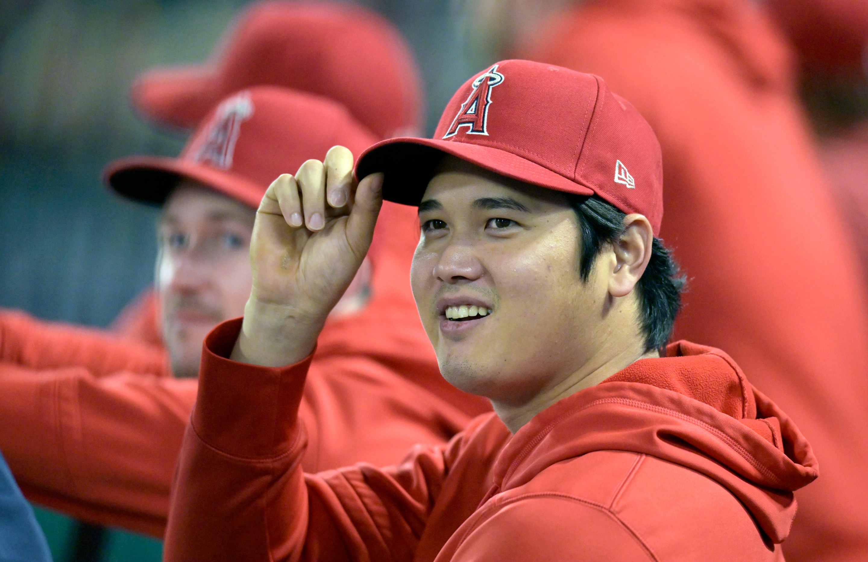 Shohei Ohtani sits on the bench during a September Angels game in 2023.